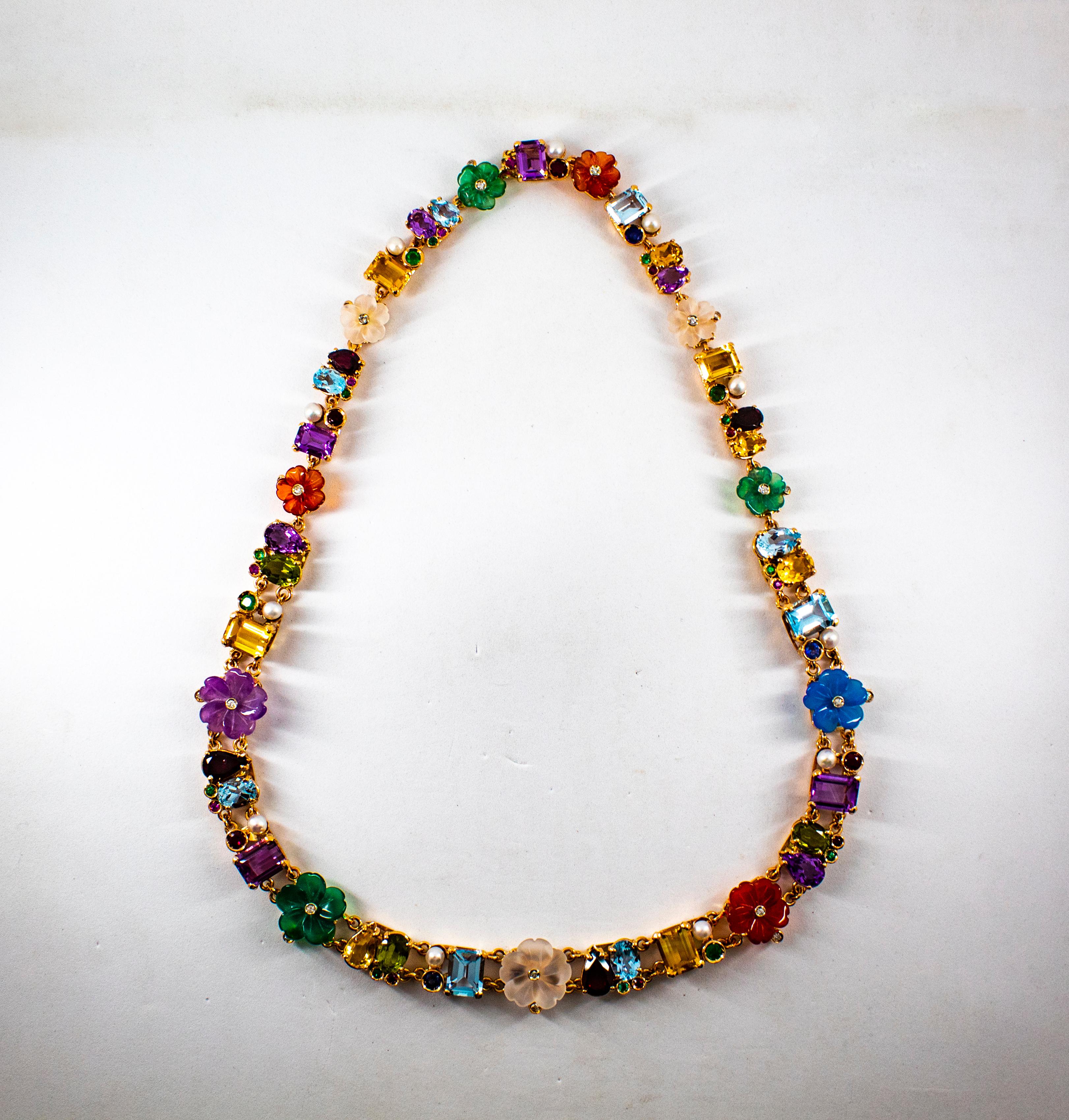This Necklace is made of 14K Yellow Gold but we can make it also in 9 or 18K Yellow or White Gold. 
This Necklace has 0.30 Carats of White Modern Round Cut Diamonds.
This Necklace has 0.70 Carats of Rubies.
This Necklace has 0.60 Carats of