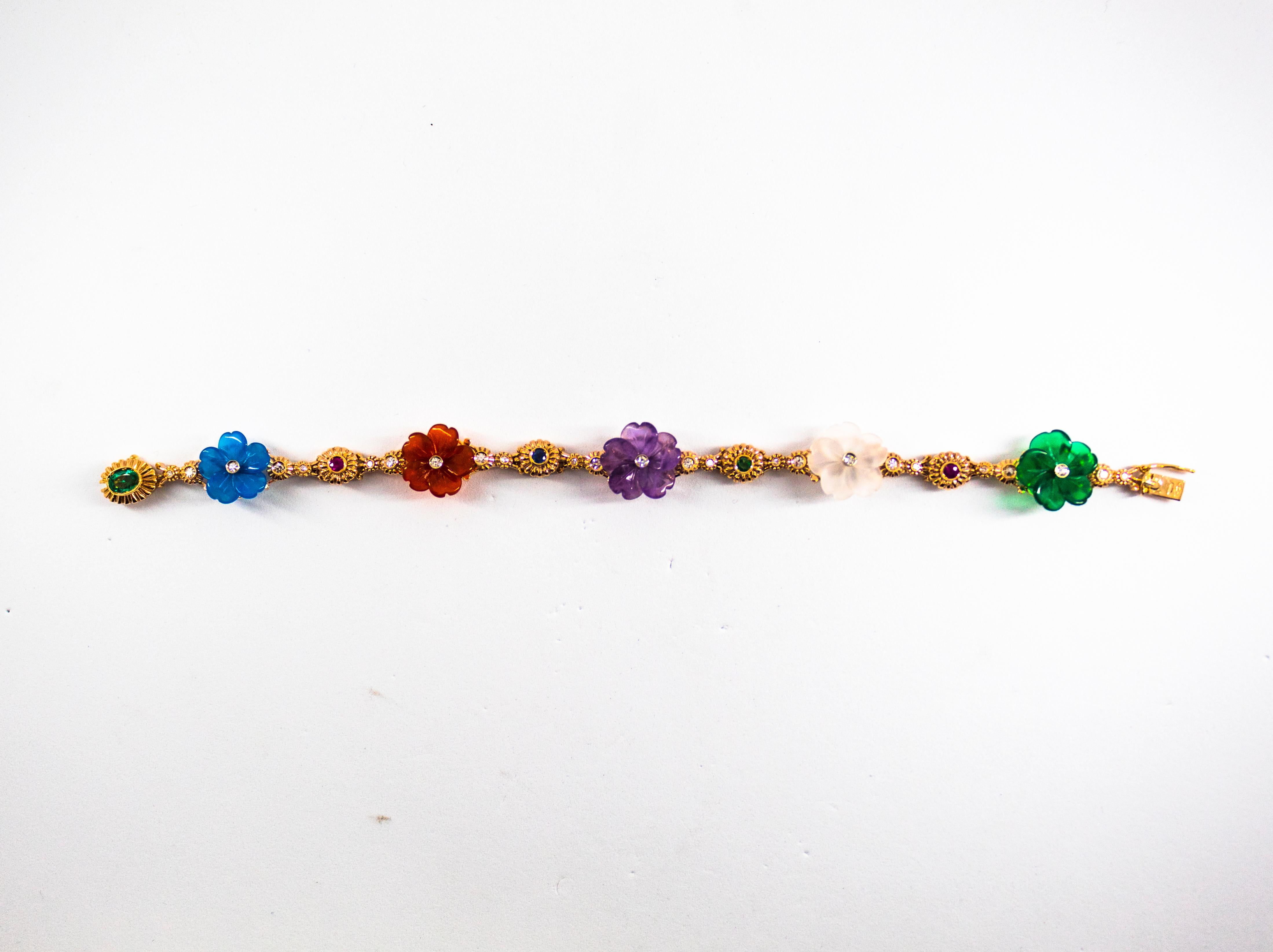This bracelet is made of 14k Yellow Gold.
This bracelet has 0.45 Carats of White Diamonds.
This bracelet has 0.80 Carats of Rubies, Emeralds and Blue Sapphires.
This bracelet has also Rock Crystal, Agate, Amethyst.
We're a workshop so every piece is