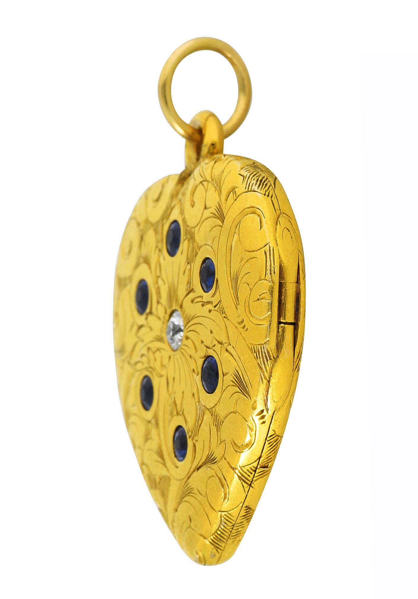 Women's or Men's Art Nouveau Diamond Sapphire 14 Karat Two-Tone Gold Scroll Heart Locket Pendant For Sale