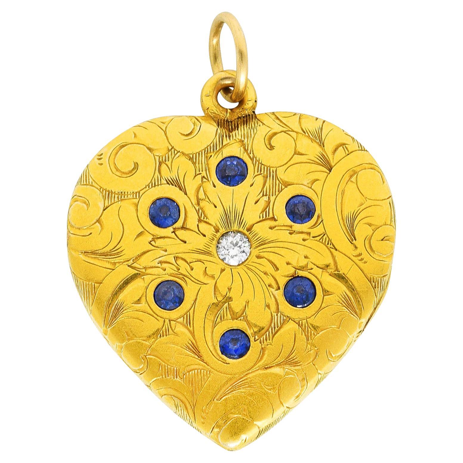 Art Nouveau Diamond Sapphire 14 Karat Two-Tone Gold Scroll Heart Locket Pendant