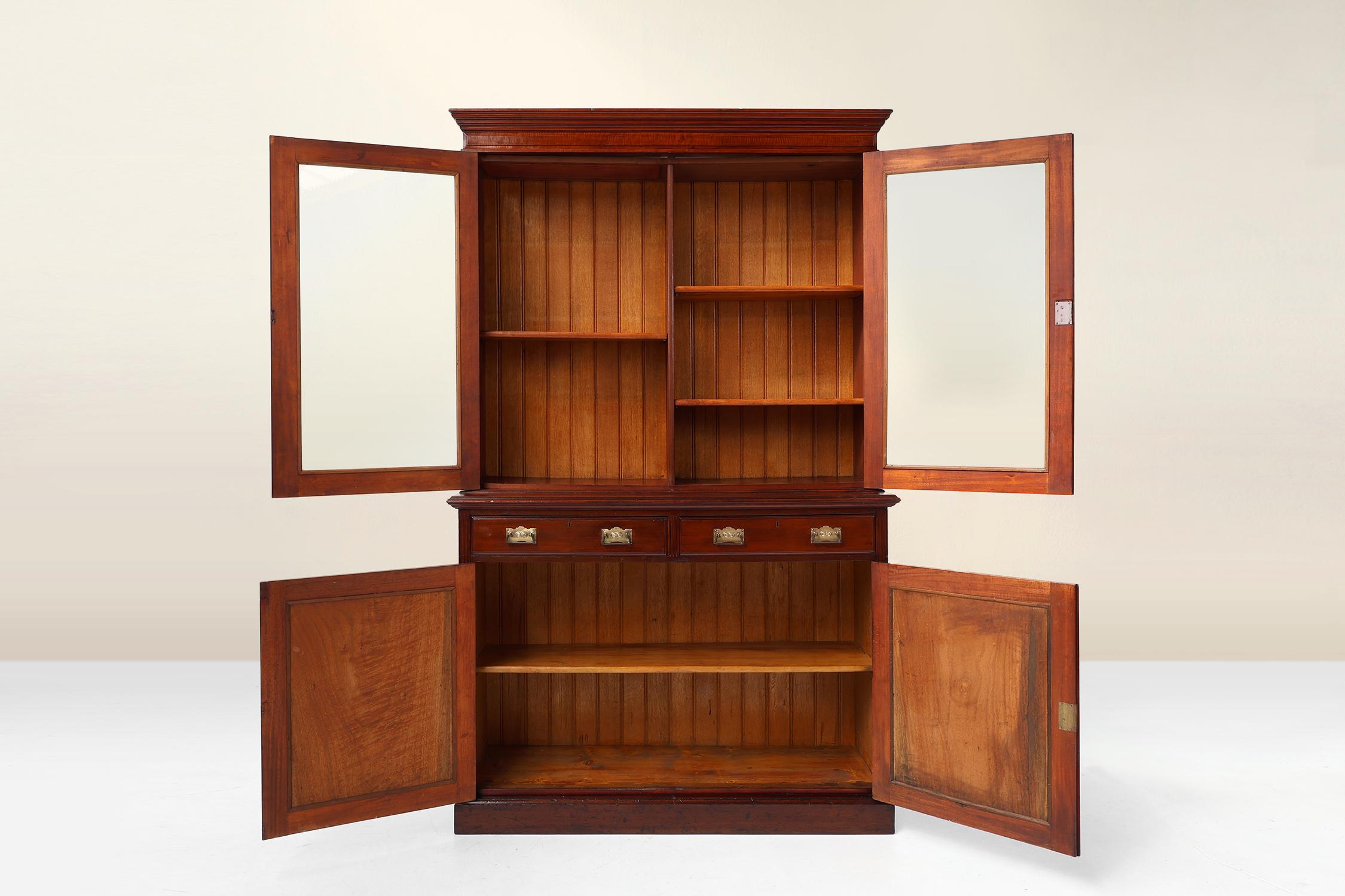 Belgium / 1910 / Display Cabinet / wood, glass / Art Nouveau / Arts and Crafts / Jugenstil

Art Nouveau display cabinet or bookcase in oak. Crafted in the early 20th century in Belgium. The lower part has two carved doors with beautiful hardware and