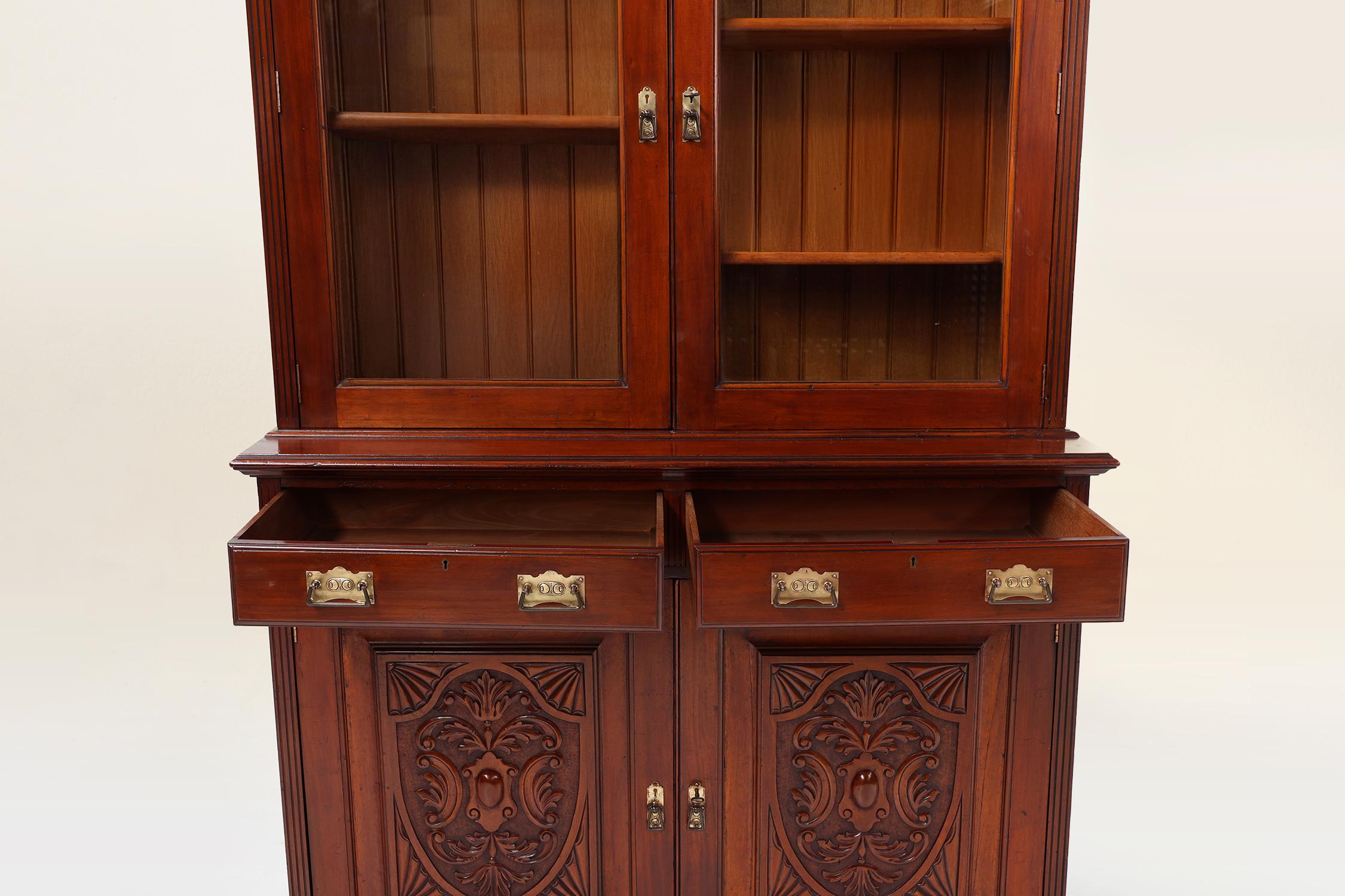 Art Nouveau Display Cabinet or Bookcase in oak with carvings and glass doors For Sale 1