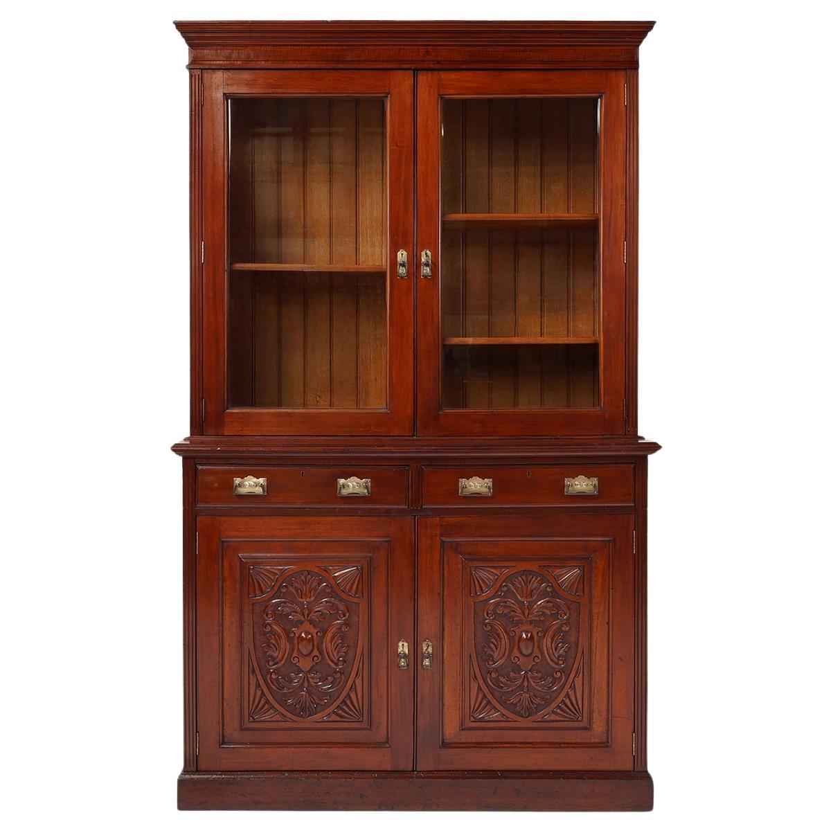 Art Nouveau Display Cabinet or Bookcase in oak with carvings and glass doors