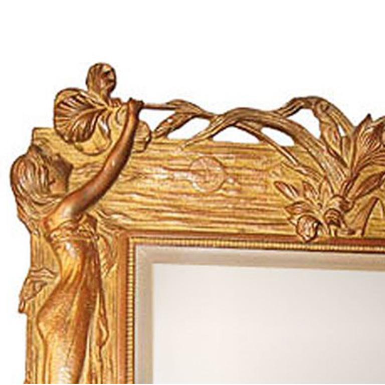 Art Nouveau easel back frame dressing table mirror with two women figures.