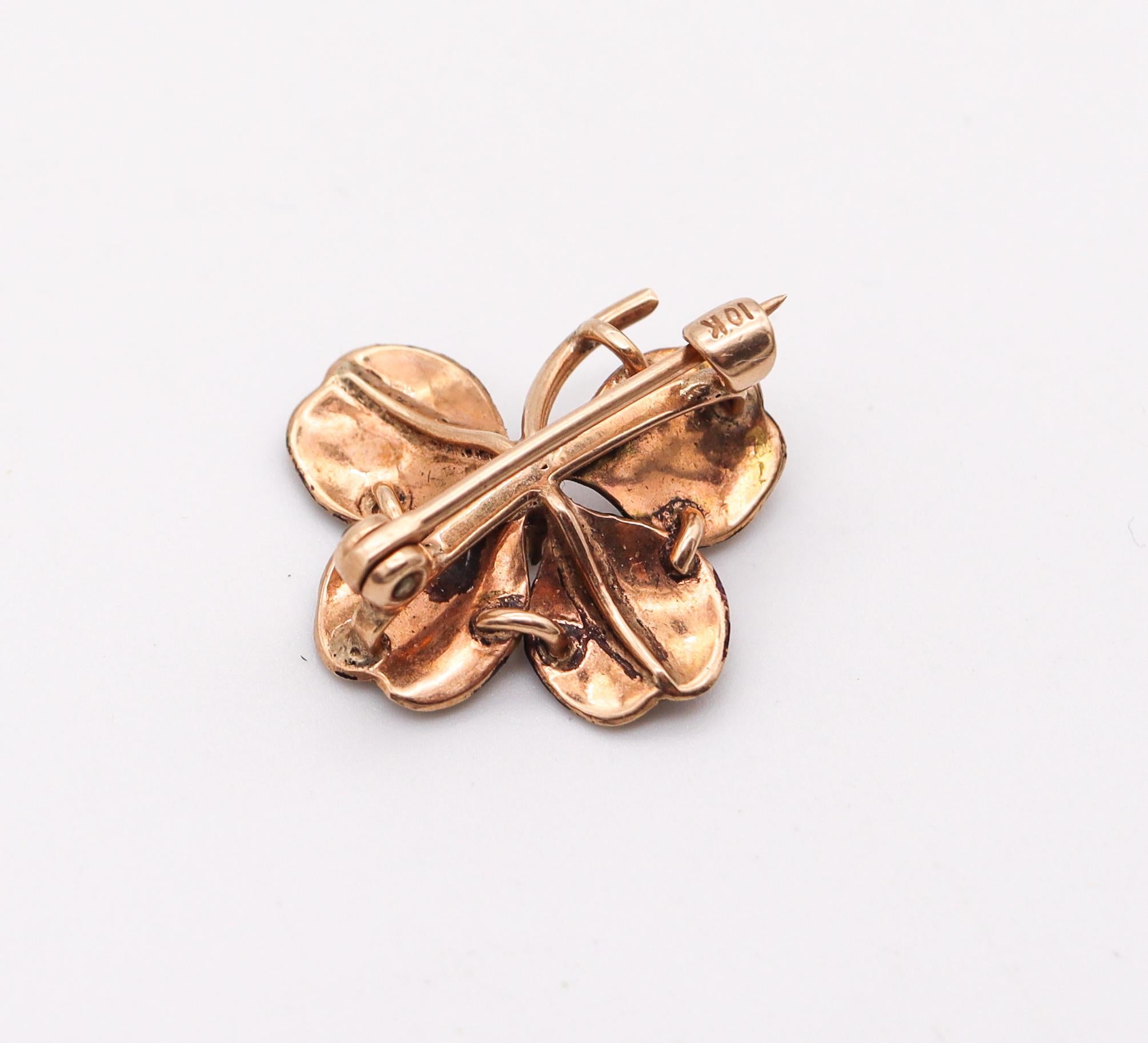 Edwardian enameled black Orchid pin.

Beautiful three-dimensional piece, created in America during the Edwardian and the Art Nouveau periods, back in the 1901-1910. This beautiful pin brooch has been carefully crafted in solid yellow gold of 14 and