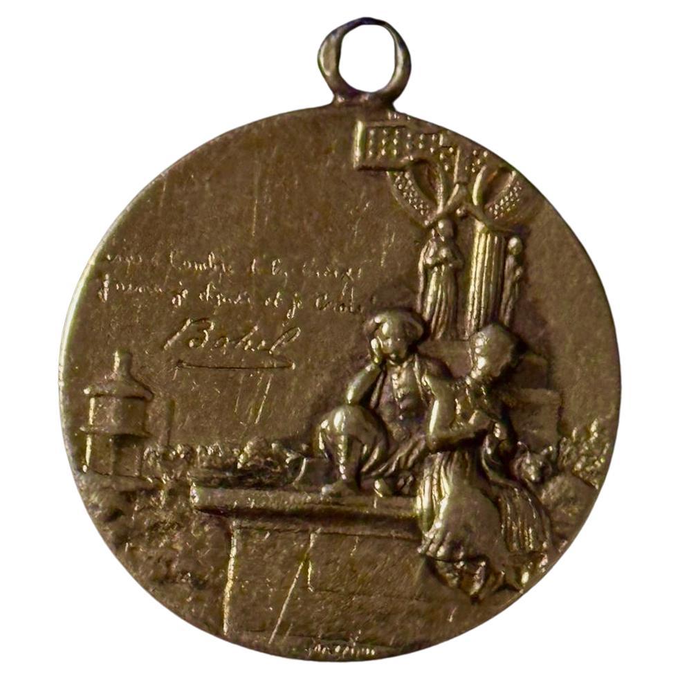 Magnificent Art Nouveau Edwardian period (circa 1919) Love pendant created by the prominent French jeweler Mazzoni. Made from 18 ct yellow solid gold it has the image of the two lovers. The romantic inspiration is situated on the front side; 
