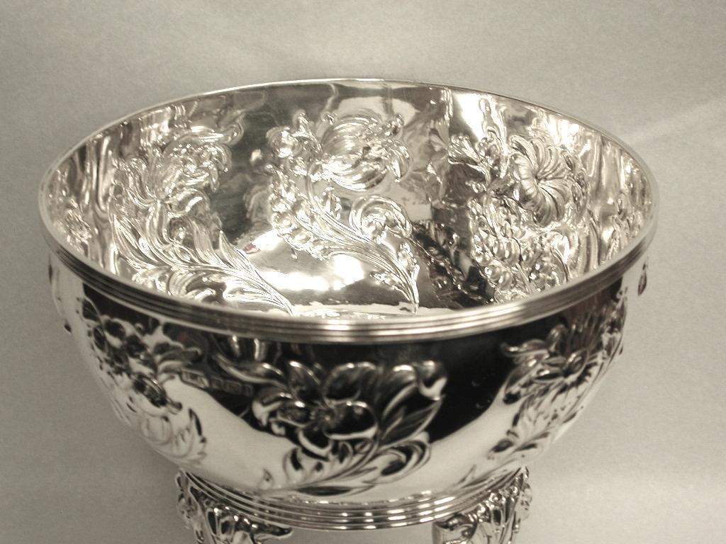 Art Nouveau silver rose bowl, decorated with several different types of flowers.
Sitting on a separate stand which is also hallmarked.
Made in Sheffield by Henry Atkins.
This bowl is beautifully made in heavy gauge silver with eight different