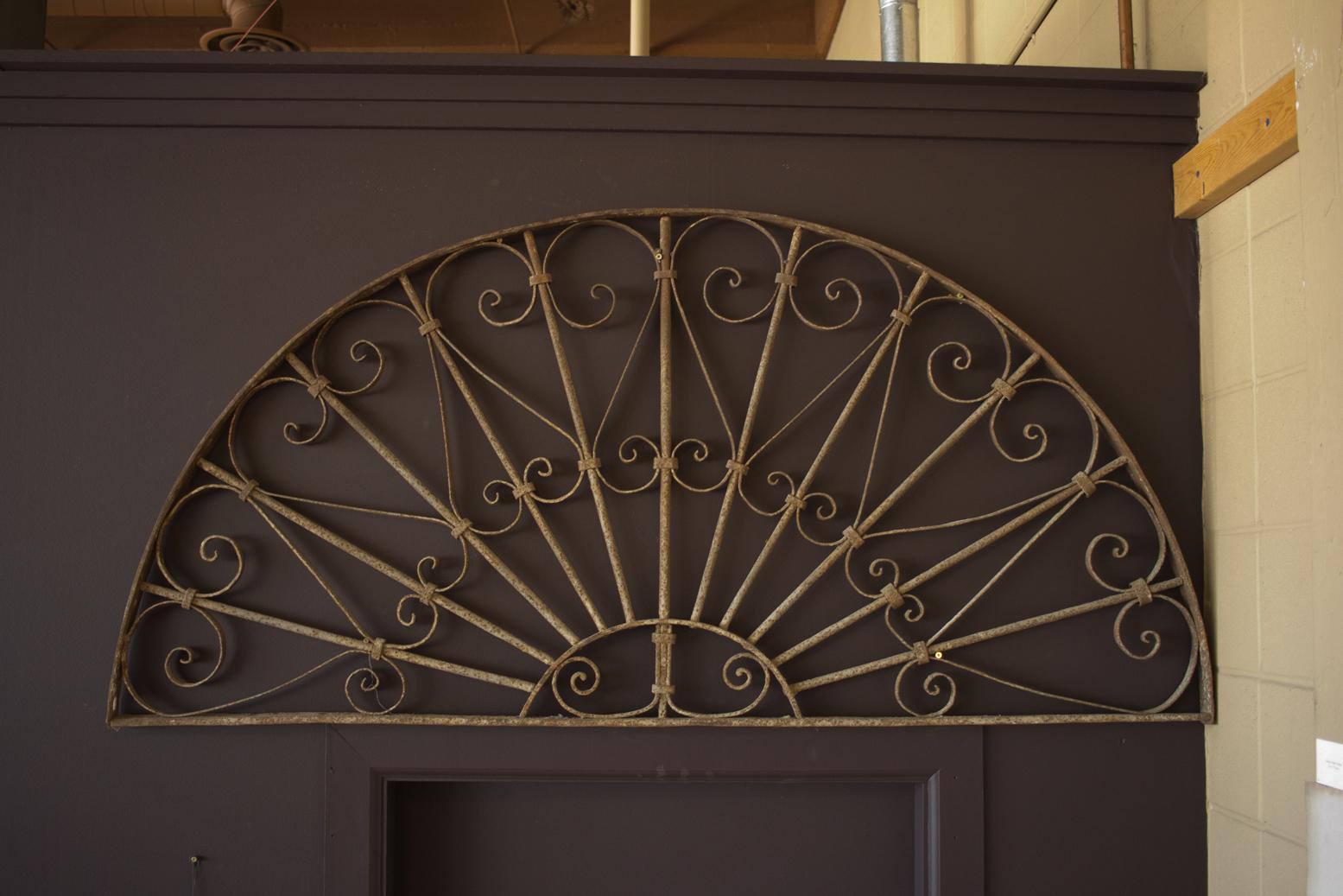 Antique Art Nouveau wrought iron window transom. Lovely above a doorway or as a headboard.