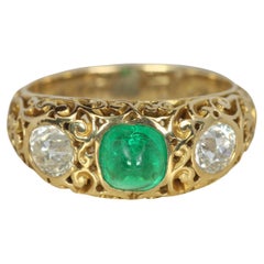 Antique Art Nouveau Emerald & Old European Cut Diamond Three-Stone Ring in Yellow Gold