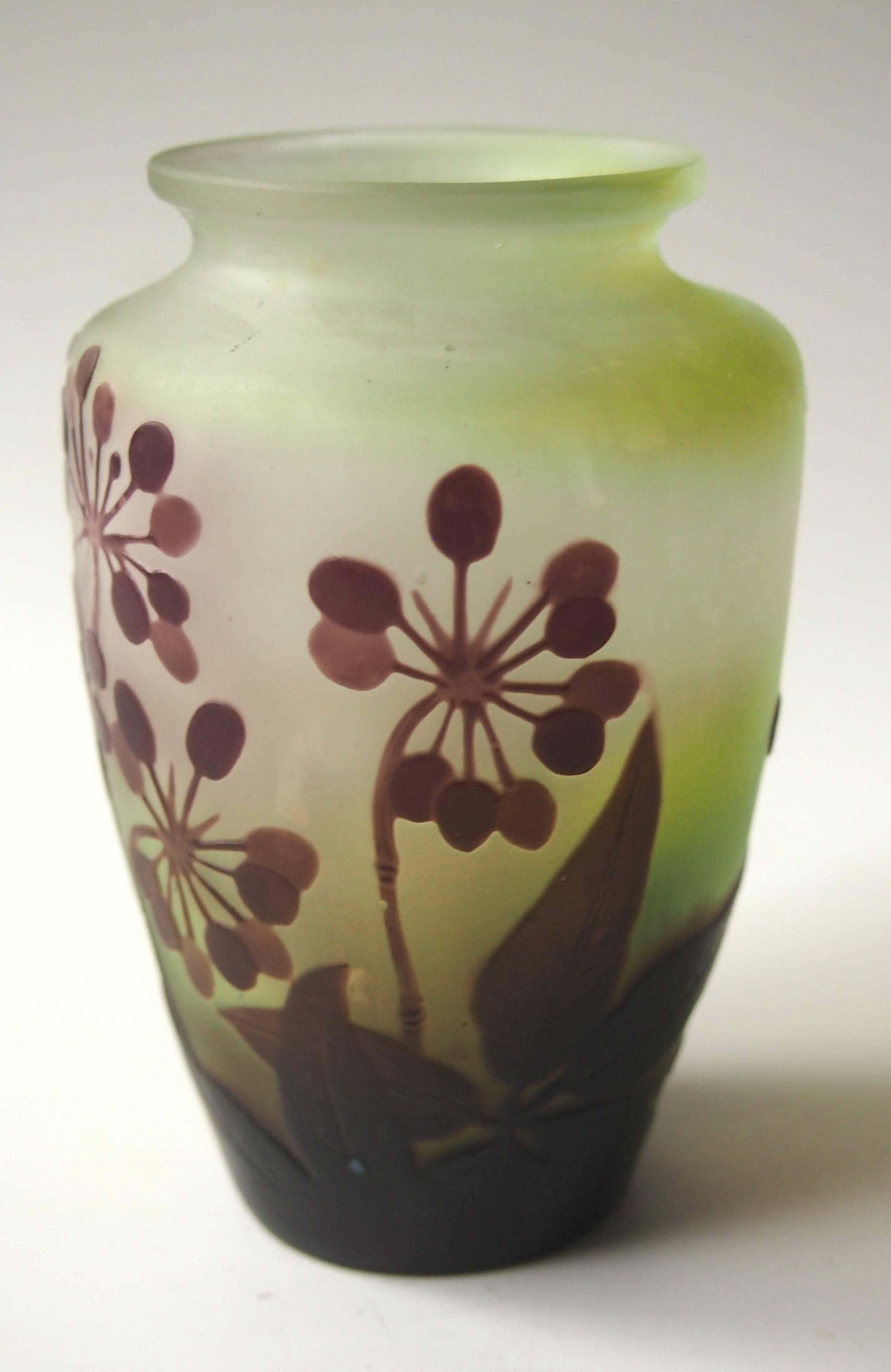 Fine Art Nouveau signed Emile Galle cameo vase in greens and purples, depicting the D'Ombelles plant -a Classic French design.

Emile Galle was probably the greatest glass maker of all time and one of the founding fathers of the Art Nouveau