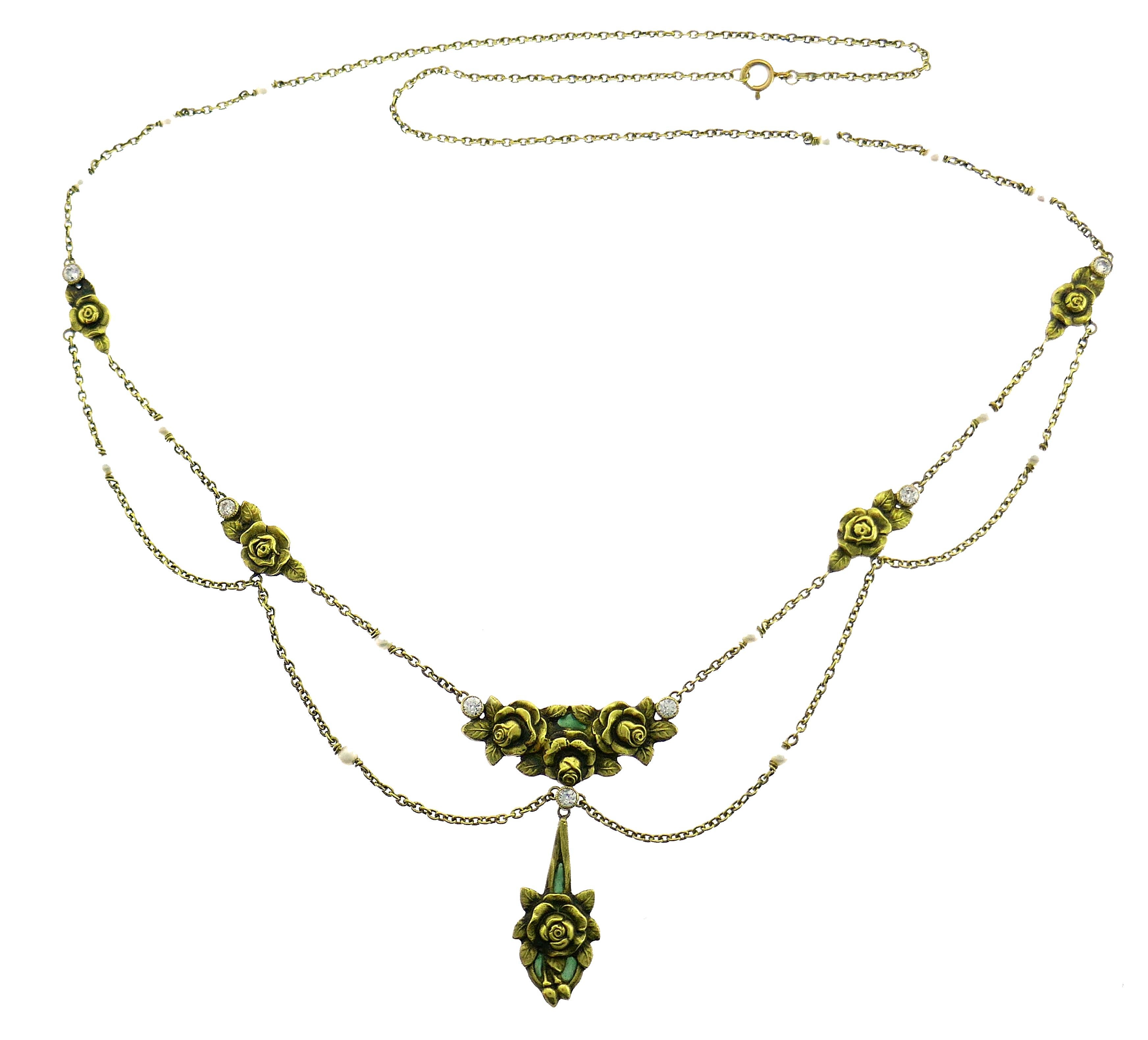 Exquisite Art Nouveau Egyptian revival set created in the 1930s. Delicate, feminine and wearable, the set is a great addition to your jewelry collection.
The set is made of 14 karat (tested) yellow gold, seed pearl and Old European cut diamonds and