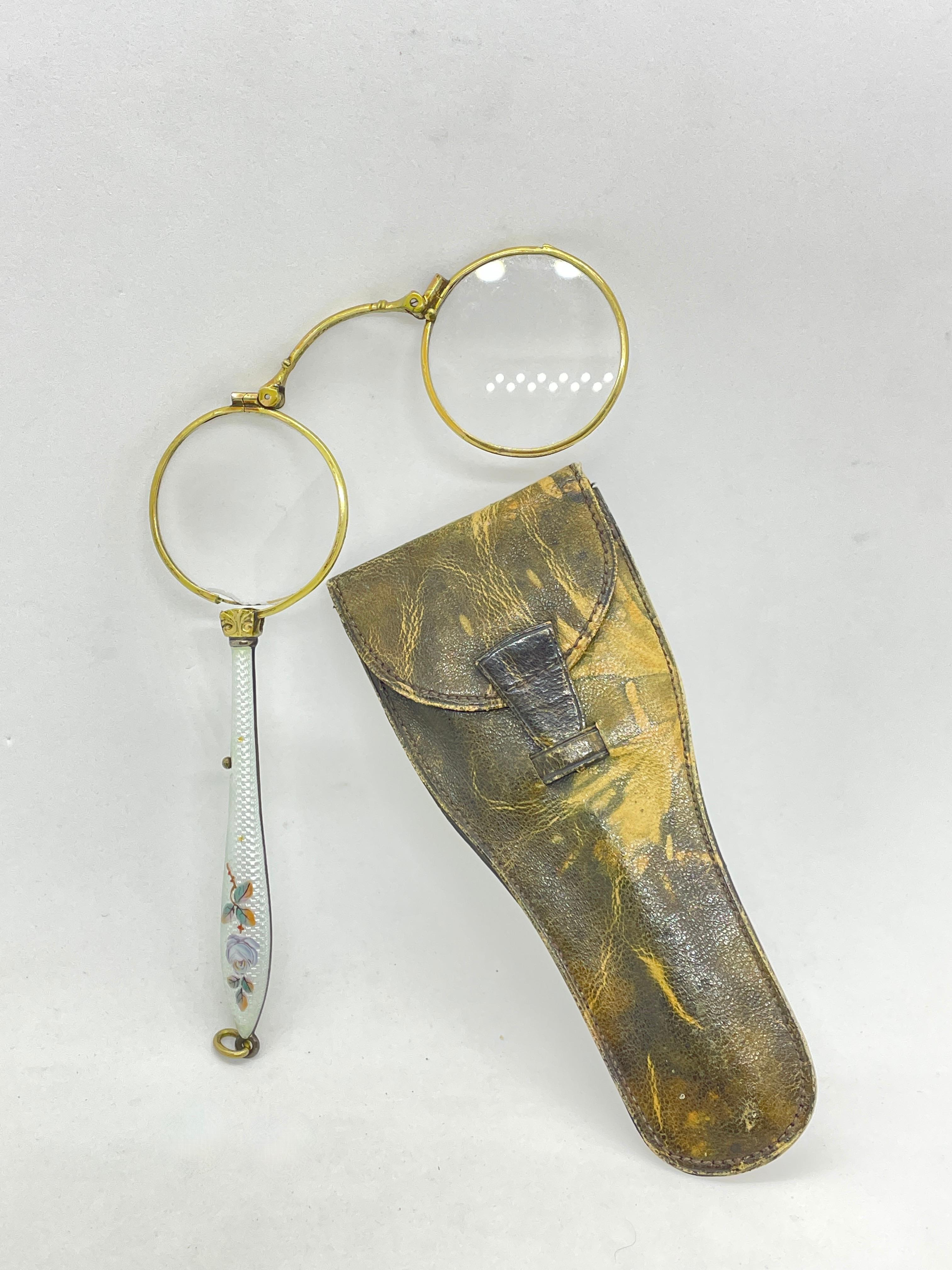 A gorgeous old fashioned 835 silver antique lorgnette with a enamel design on the handle. This pair of eyeglasses or opera glasses feature a 