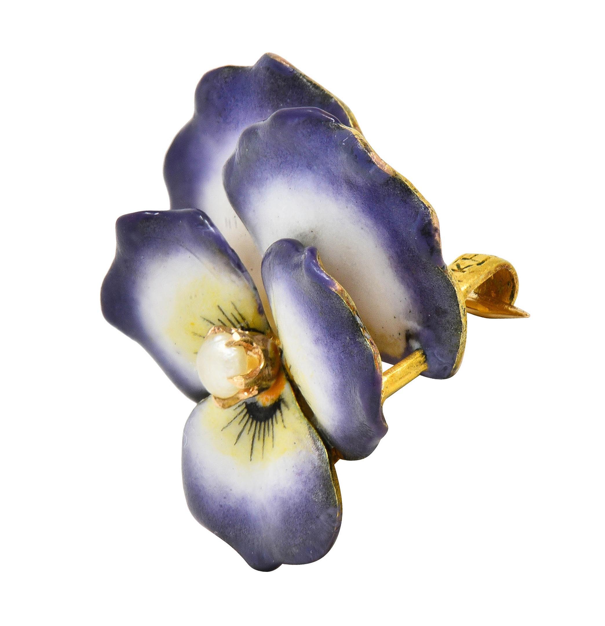 Designed as a dimensional pansy flower painted with enamel 
Opaque white, yellow, and purple with minimal loss 
Centering a 3.0 mm near-round button pearl
White with subtle iridescence
Completed by a hinged pinstem with looped closure 
Stamped for