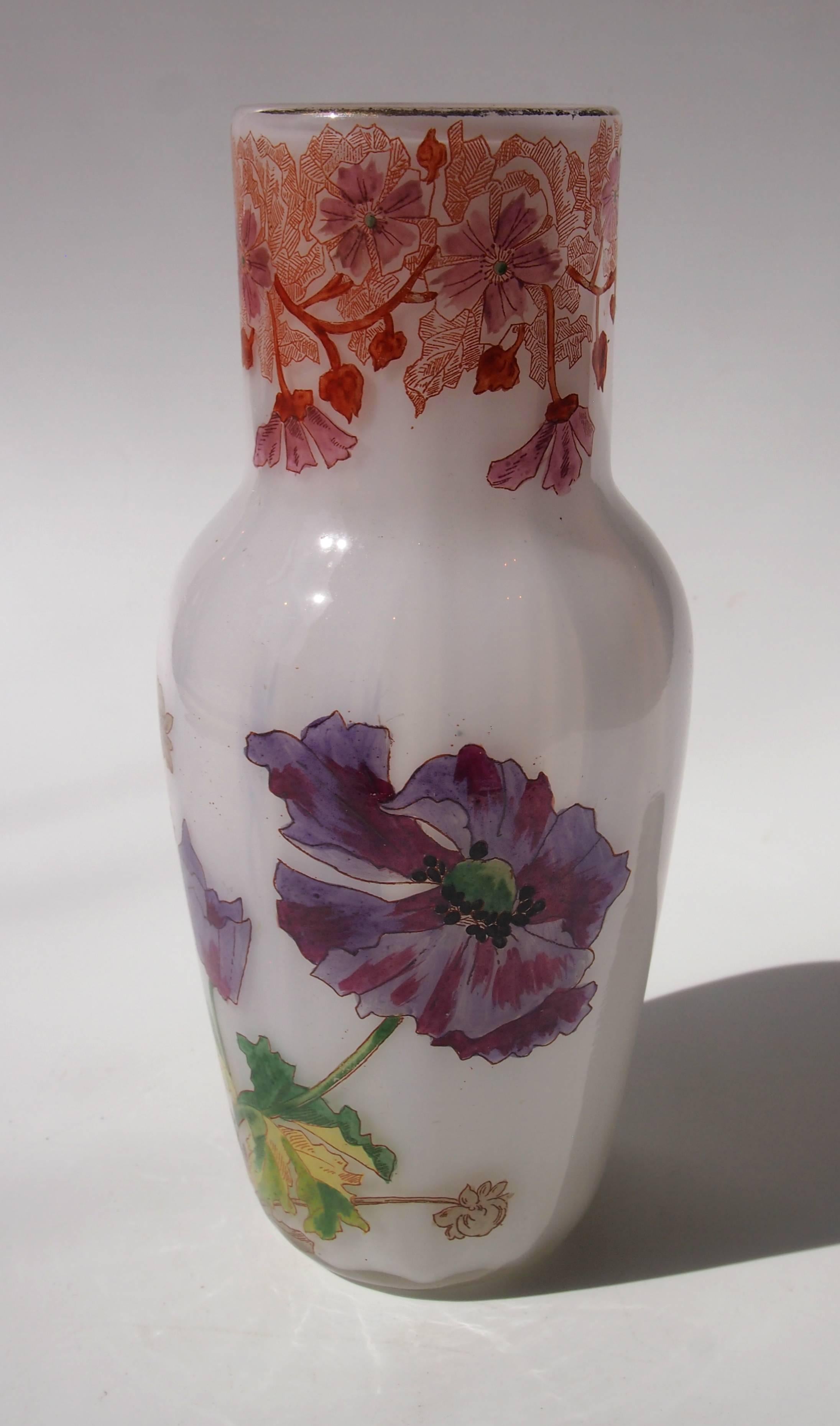 Rare and unusual Art Nouveau enamel on white opal Legras vase -enameled with vibrant polychrome flowers. This vase is feature in the Legras book. Legras at the time were the most important of the Parisian glass makers.