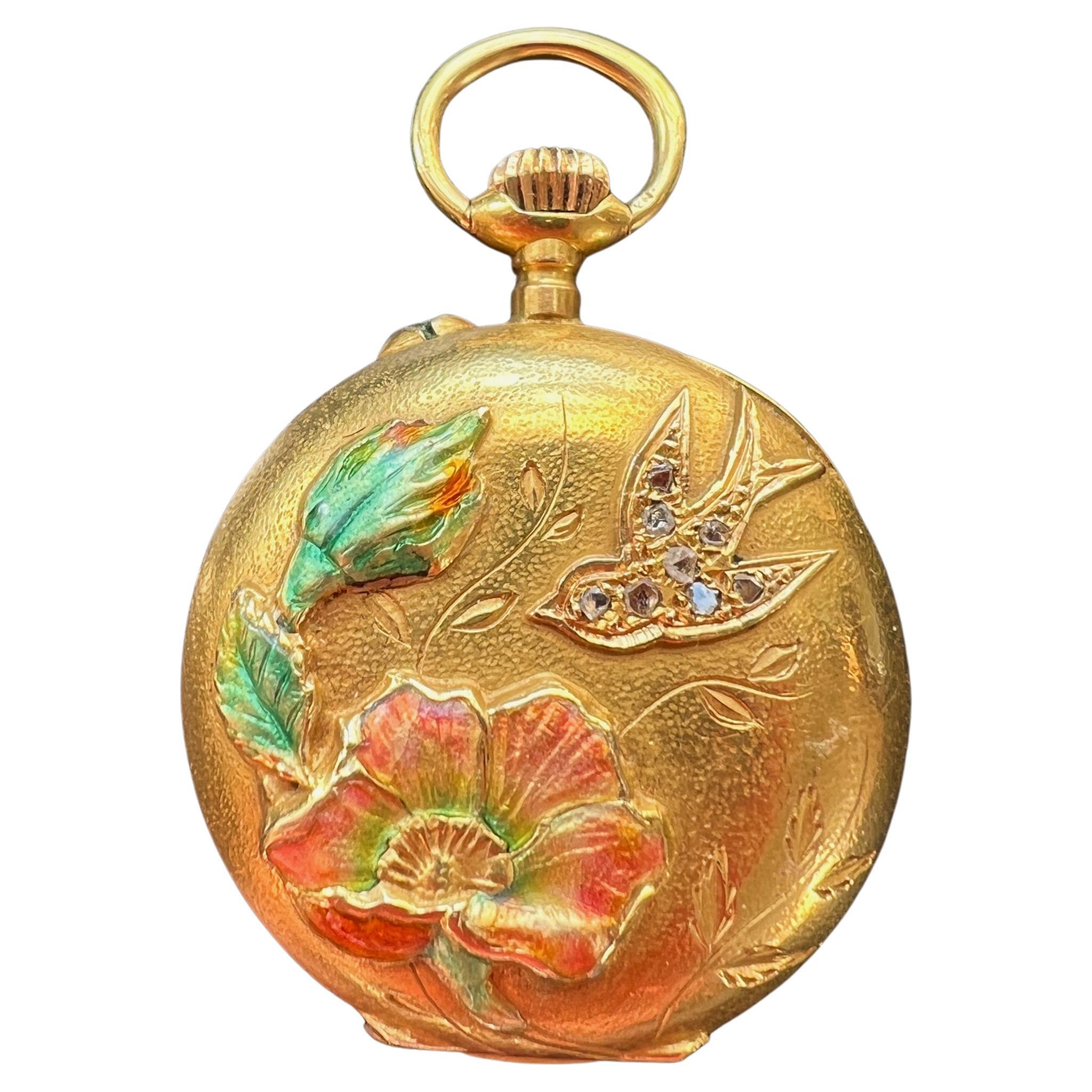 Pendentif pour montre de poche en or 18 carats, diamant, fleur de lys, hirondelle, époque Art nouveau.