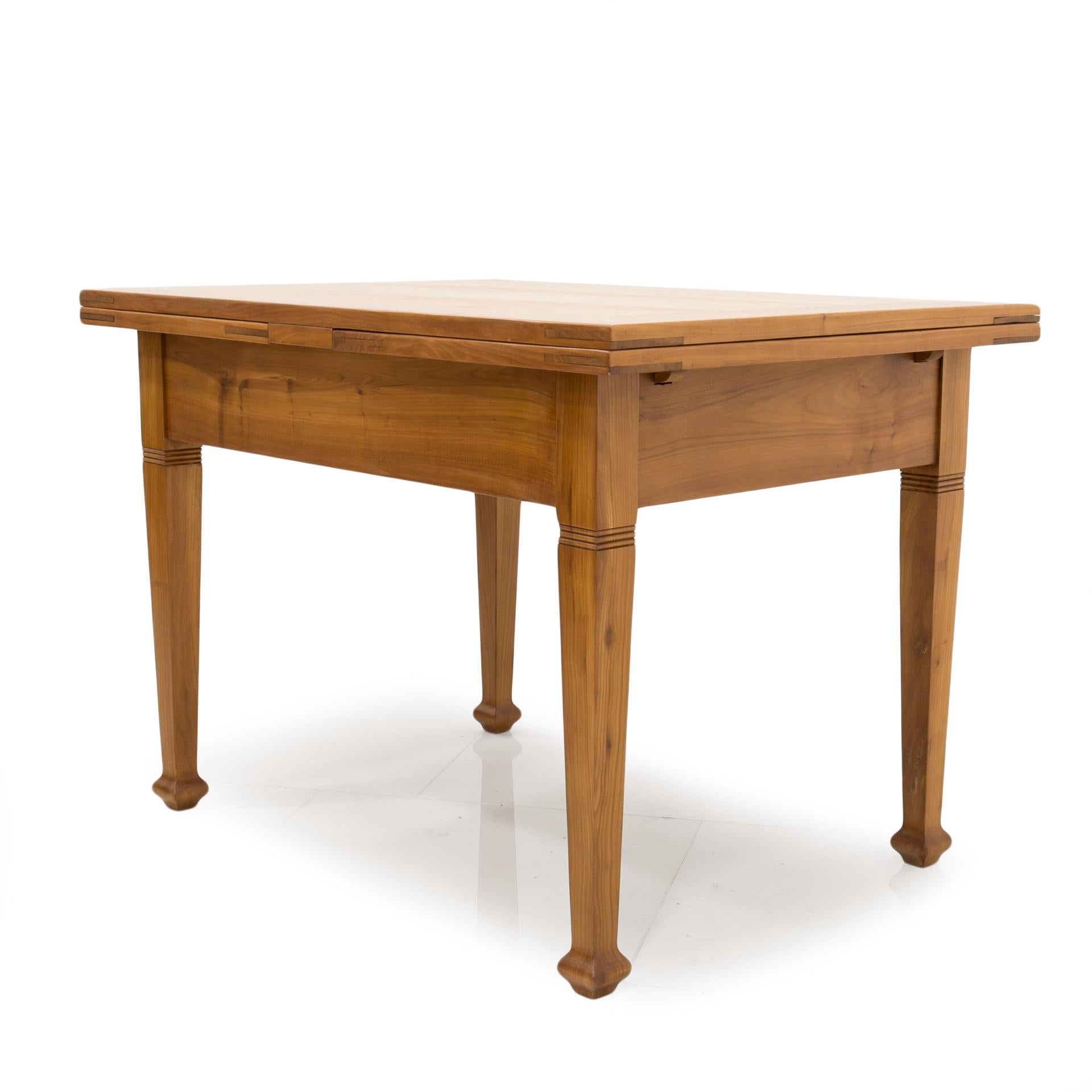 cherry wood extendable dining table