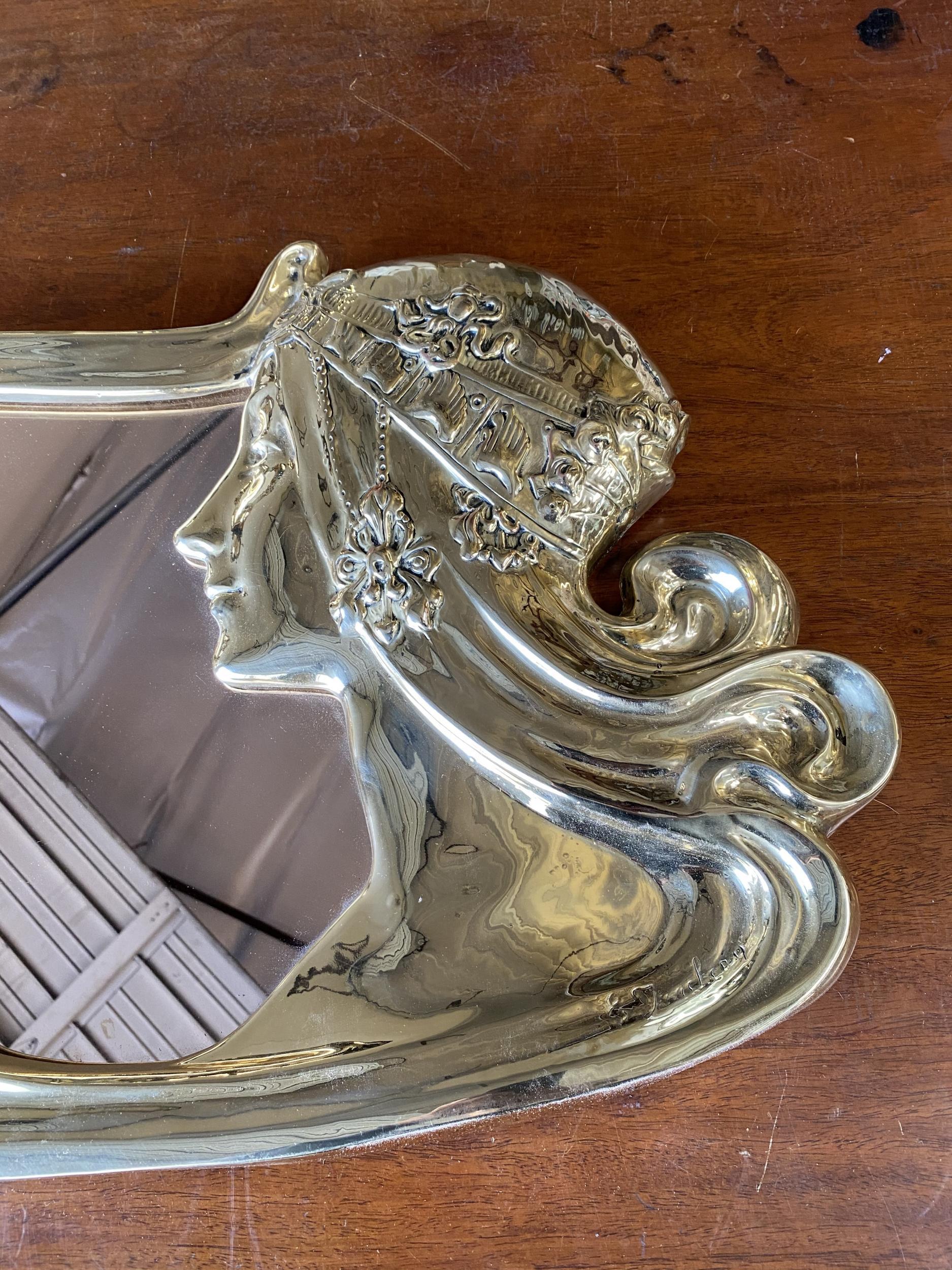 Art Nouveau figural female wall mirror signed Charles Emile Jonchery, circa 1900

The mirror was replated in Bronze.
