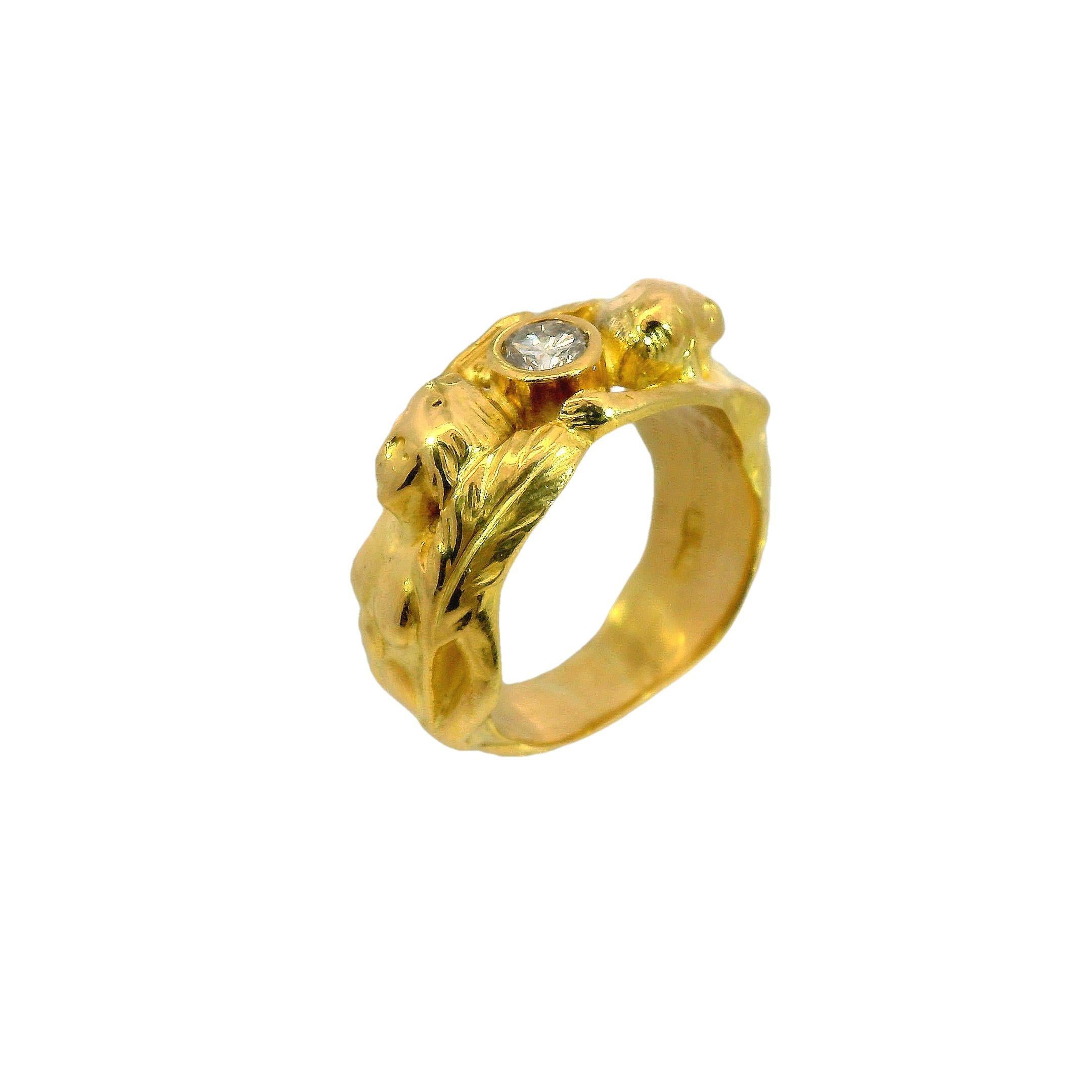 Art Nouveau Figural Woman Ring Made in 18K Gold with Diamond Center

This exquisite statement ring from the late 19th century is a captivating example of Art Nouveau craftsmanship. Made from 18k yellow gold, it features a stunning 0.31-carat