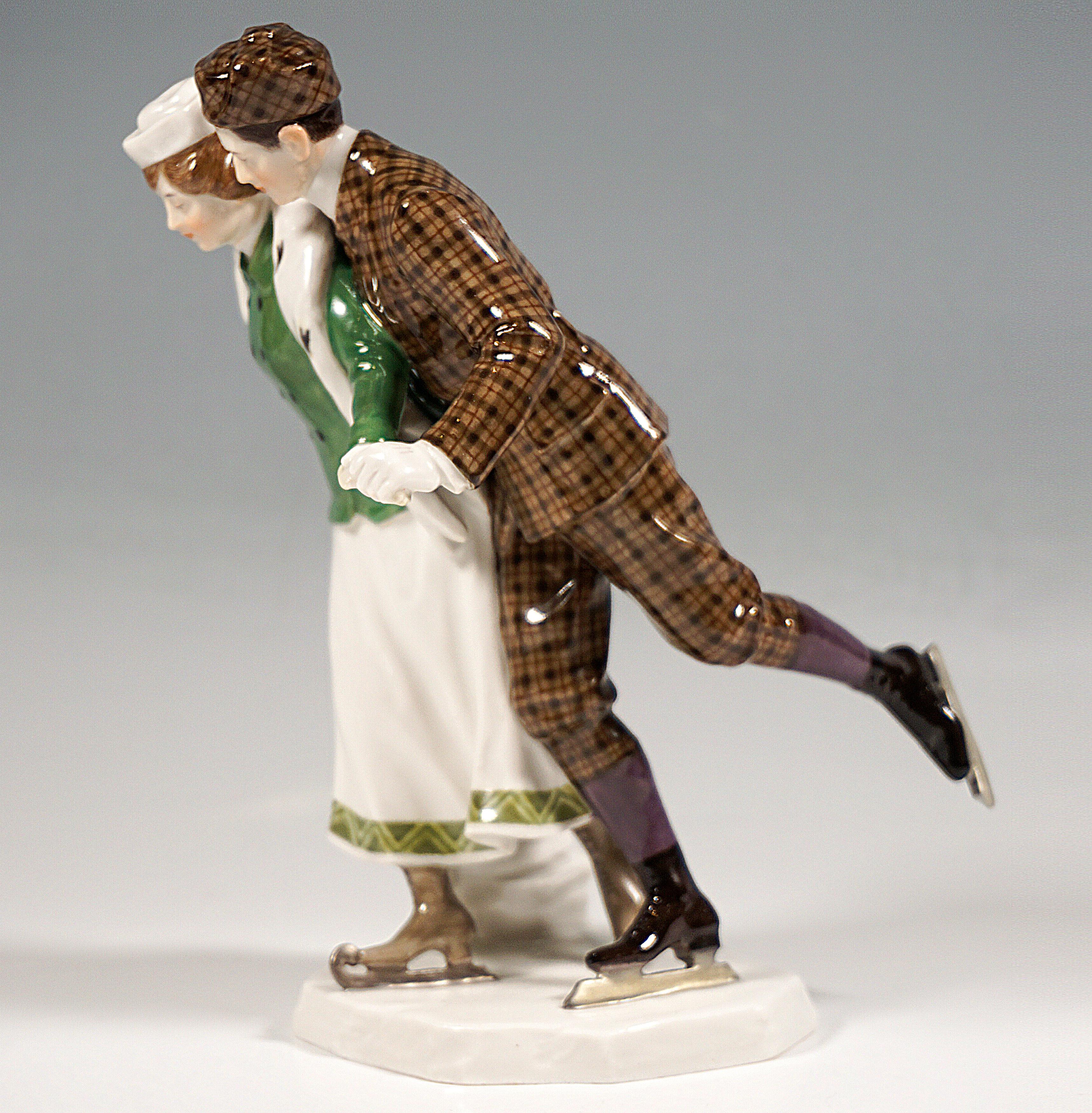 Delicate and rare Meissen Art Nouveau porcelain group:
Skating couple in elegant winter clothing: The lady in a long, white skirt with a green decorated hem, green jacket and white cap, and long ermine scarf, the gallant in a fine, sporty, brown
