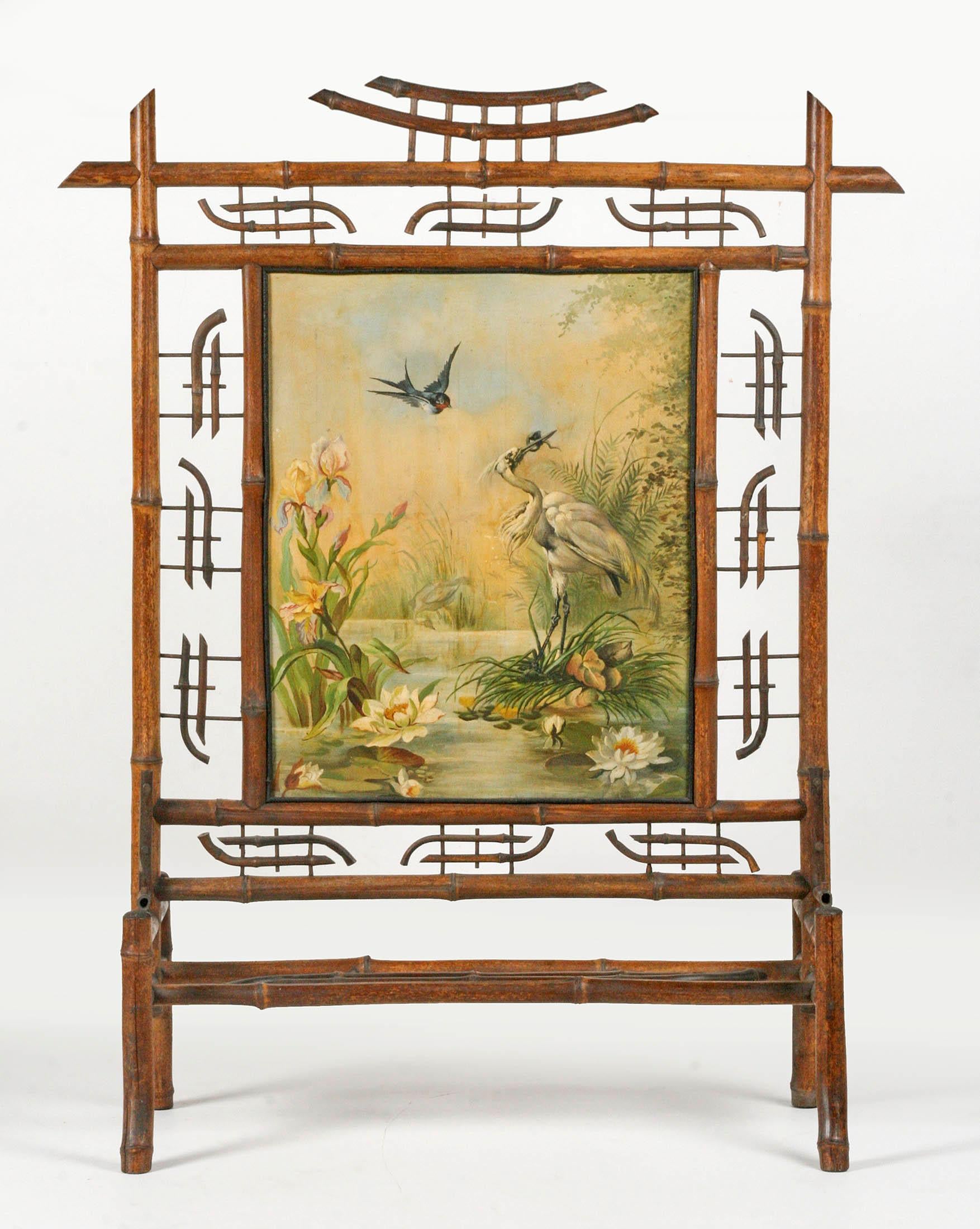 Bamboo wood fireplace screen.
The front has a beautiful painting, this is oil on canvas, with a wooden panel behind it. This painting is painted in a typical early Art Nouveau with many elements from nature and the water world. Colors have been