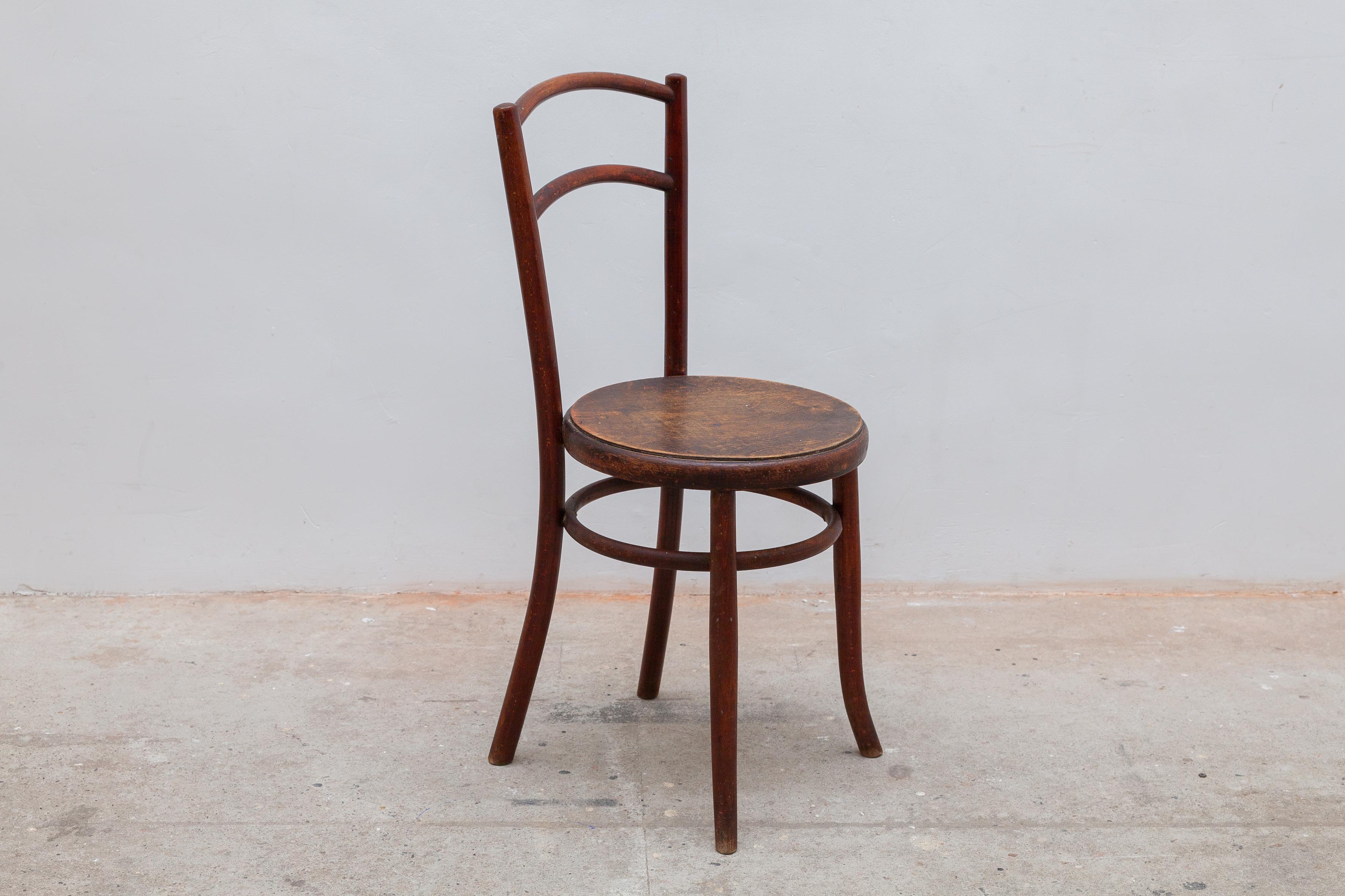 Classic collectible Art Nouveau chair by Fishel. Bentwood frame with hooped legs. In good condition with a nice patina.