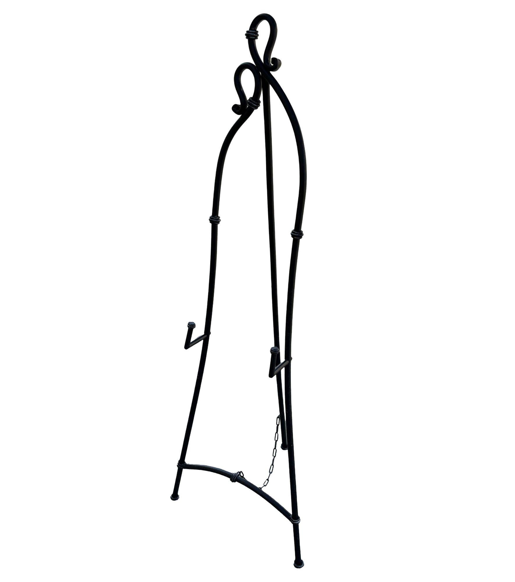 This Art Nouveau Wrought Iron Easel combines elegance and stability with flowing lines and organic curves. Its intricate vine details and graceful silhouette make it a refined choice for displaying art or decor, adding sophistication to any