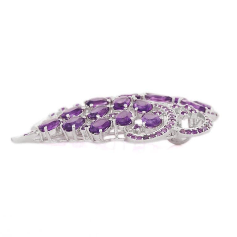 This Statement Amethyst Brooch enhances your attire and is perfect for adding a touch of elegance and charm to any outfit. Crafted with exquisite craftsmanship and adorned with dazzling amethyst which promotes physical, mental and spiritual