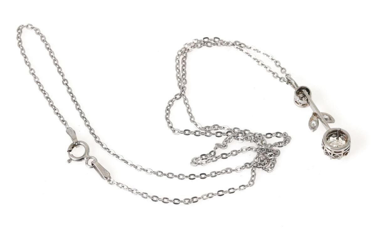 Women's or Men's Art Nouveau Floral Platinum Pendant with diamonds, early 20th century. For Sale