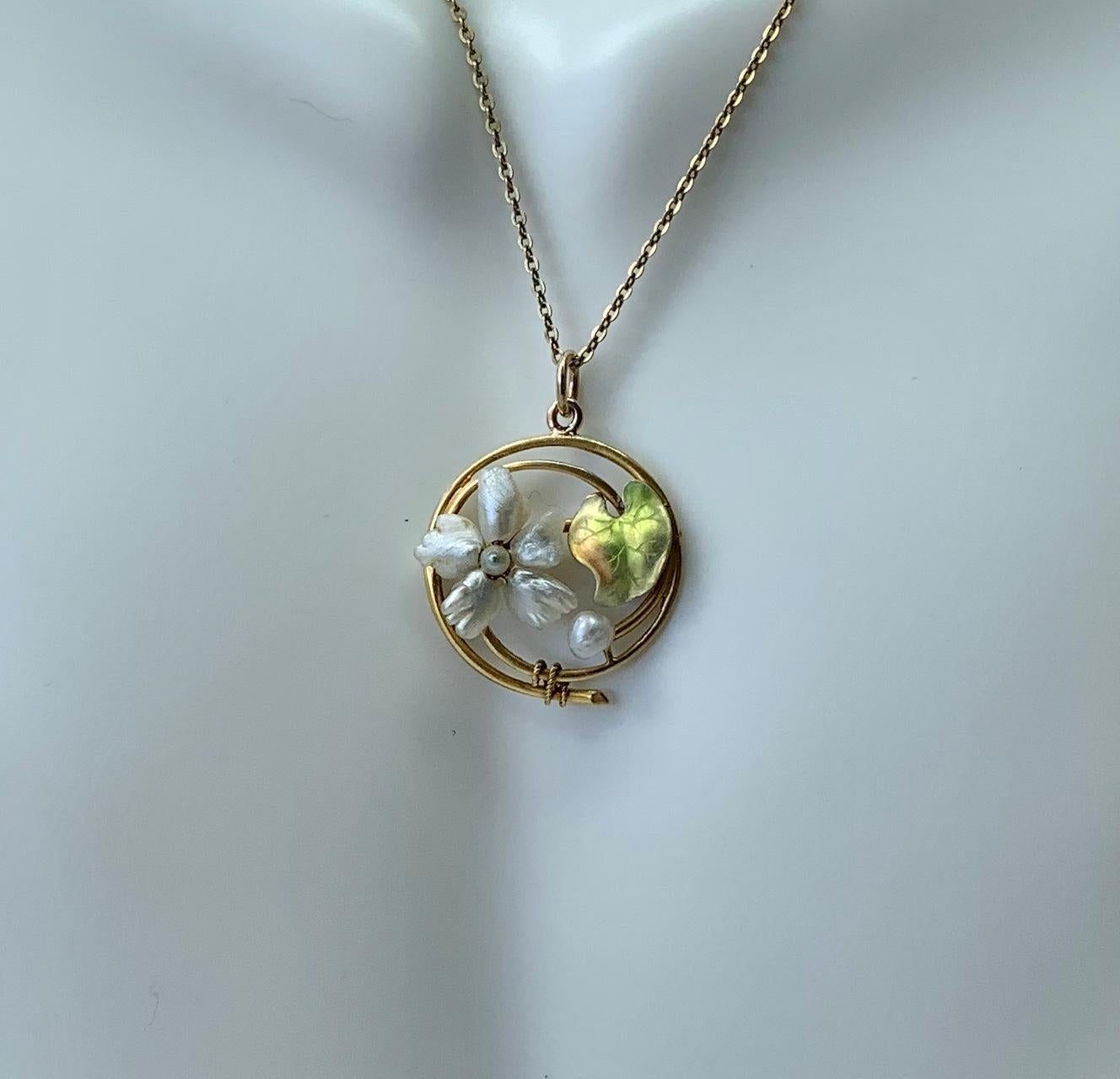THIS IS A GORGEOUS VICTORIAN - ART NOUVEAU PENDANT WITH THE MOST BEAUTIFUL FORGET-ME-NOT FLOWER AND LILY PAD MOTIF WITH EXQUISITE IRIDESCENT ENAMEL AND ELEGANT NATURAL PEARLS.  THE FLOWER AND LILY PAD ARE SET IN A GOLD SURROUND WITH LOVELY ART
