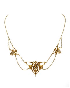 Collar con motivos florales de estilo Art Nouveau en oro mate de 18 quilates