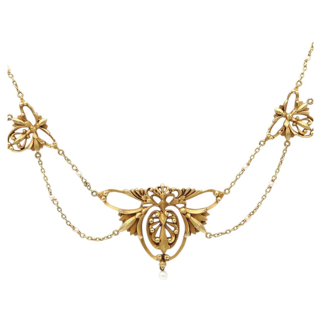 Collana con motivo floreale in stile Art Nouveau in oro opaco a 18 carati
