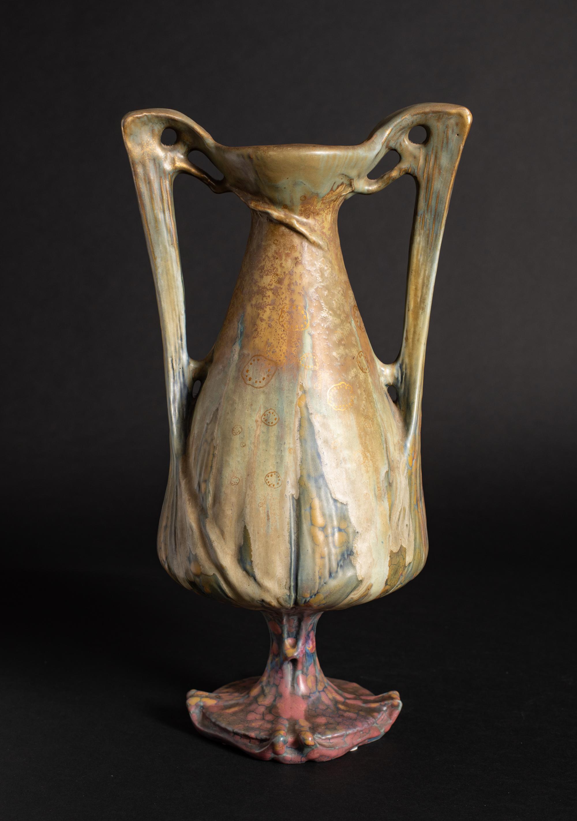 Model #3630

Riessner, Stellmacher and Kessel (RSt&K), consistently marked pieces with the tradename “Amphora” by the late 1890s and became known by that name. The Amphora pottery factory was located in Turn-Teplitz, Austria. By the mid-19th