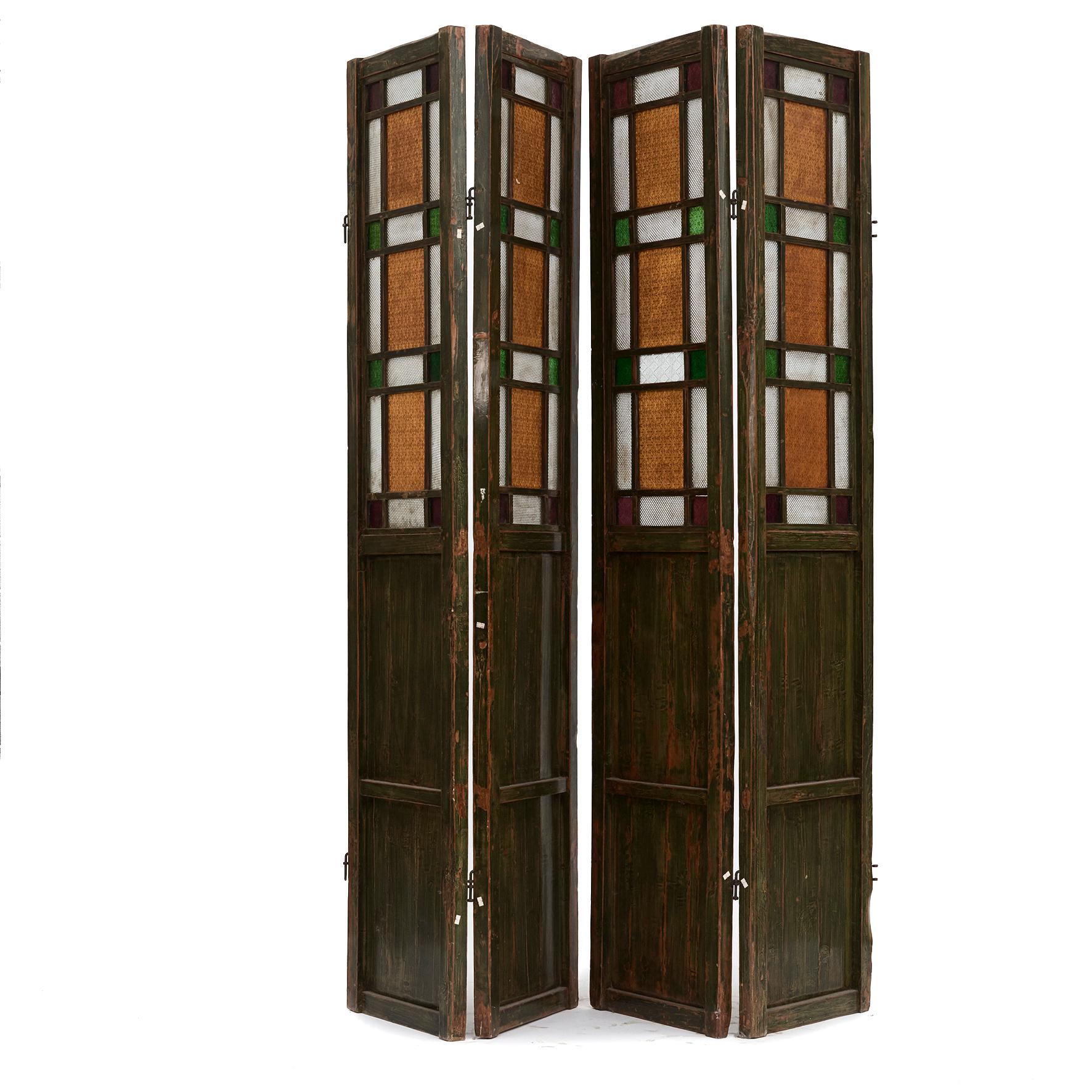 Art Nouveau four-fold screen In four sections.
Wood frame and panel with pictorial carving and original green lacquer with natural good patina.
Upper part with patterned pressed glass in polychrome, very decorative.
From house in Shanghai approx.