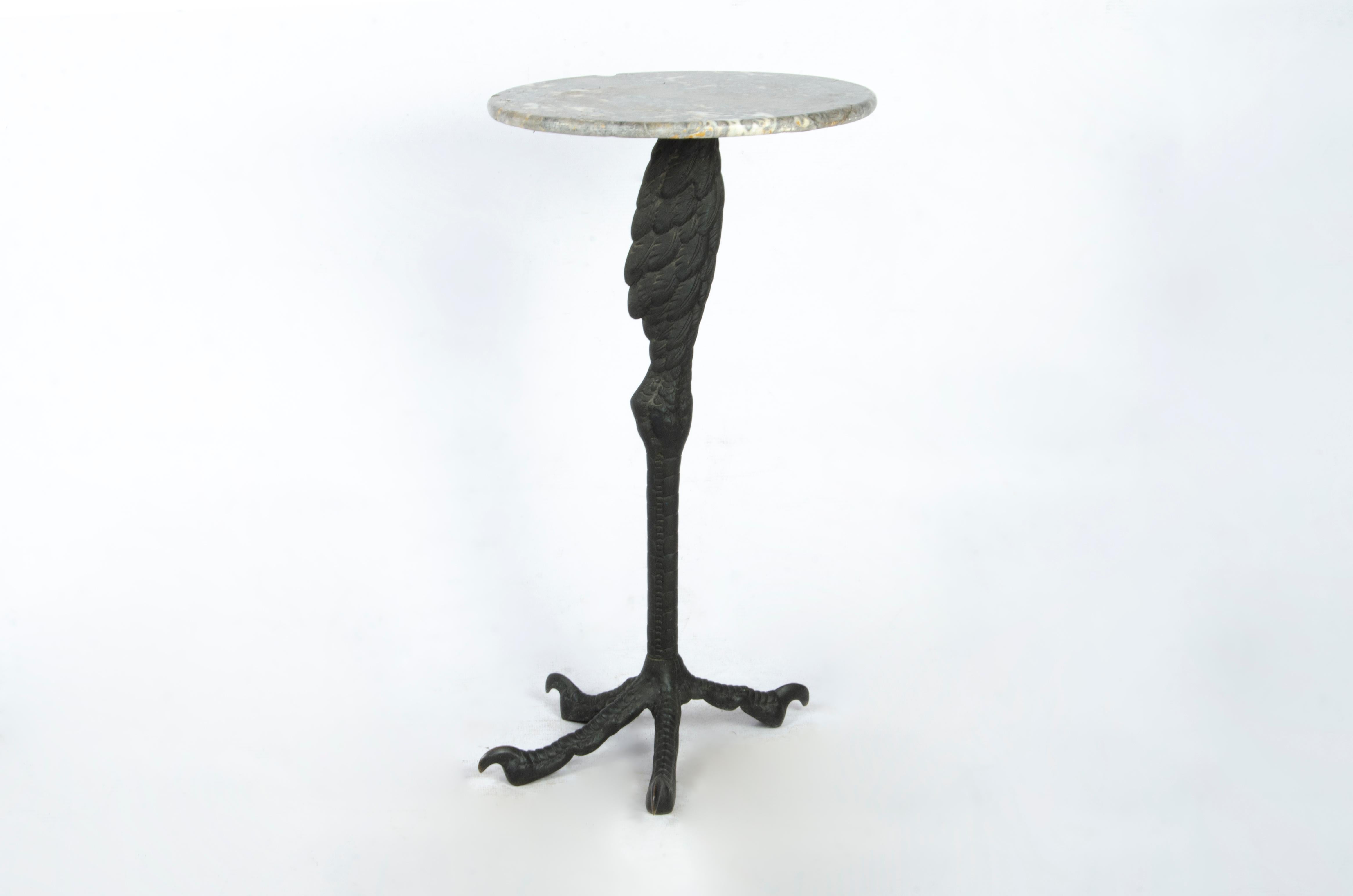 Early 20th century Art Nouveau French black patinated bronze and marble circular ostrich leg-shaped side table

By: unknown
Material: metal, copper, bronze, tin, marble, stone
Technique: cast, molded, metalwork, patinated, polished
Dimensions: 12 in