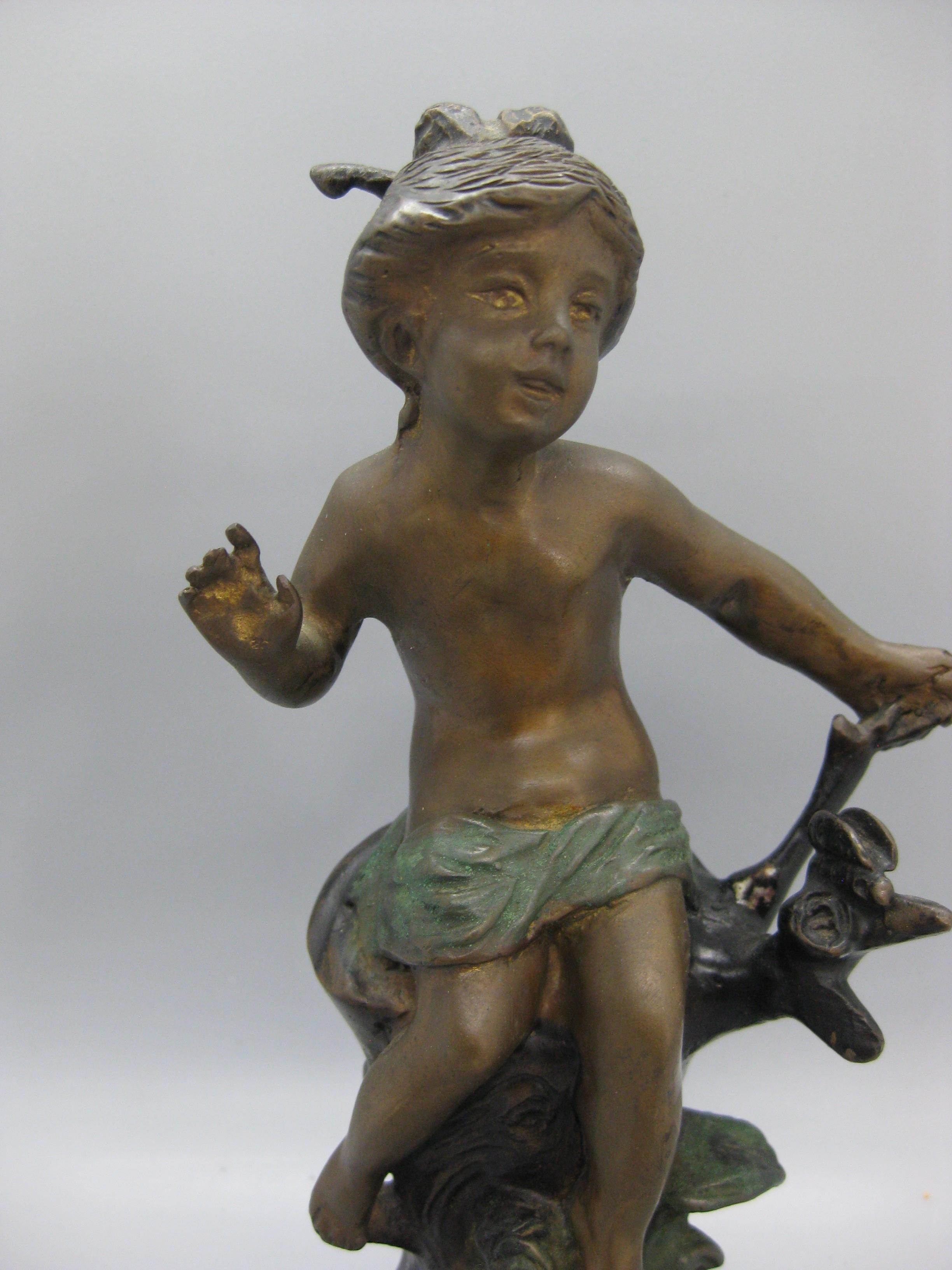 Beautiful Art Nouveau bronze sculpture by French artist Auguste Moreno. The sculpture is made of bronze with enamel painted accents. Signed on the back. Attached to a marble base. In very nice original condition and displays well.