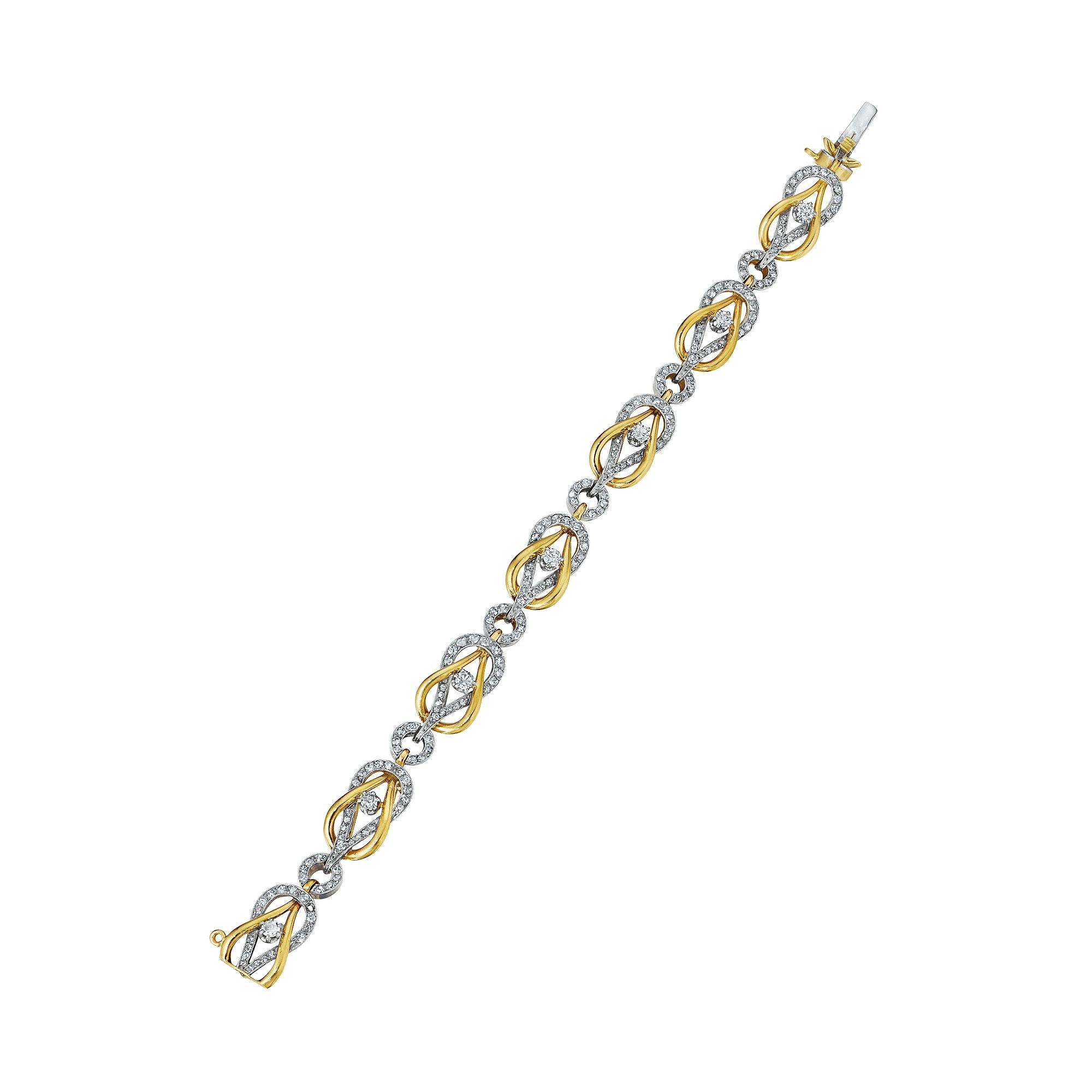 Set sail with this extraordinary French Art Nouveau diamond, 18 karat yellow gold, and platinum nautical square knot link bracelet.  With a total of 1.20 carats of vintage round cut diamonds and a unique nautical rope link design, this one-of-a-kind
