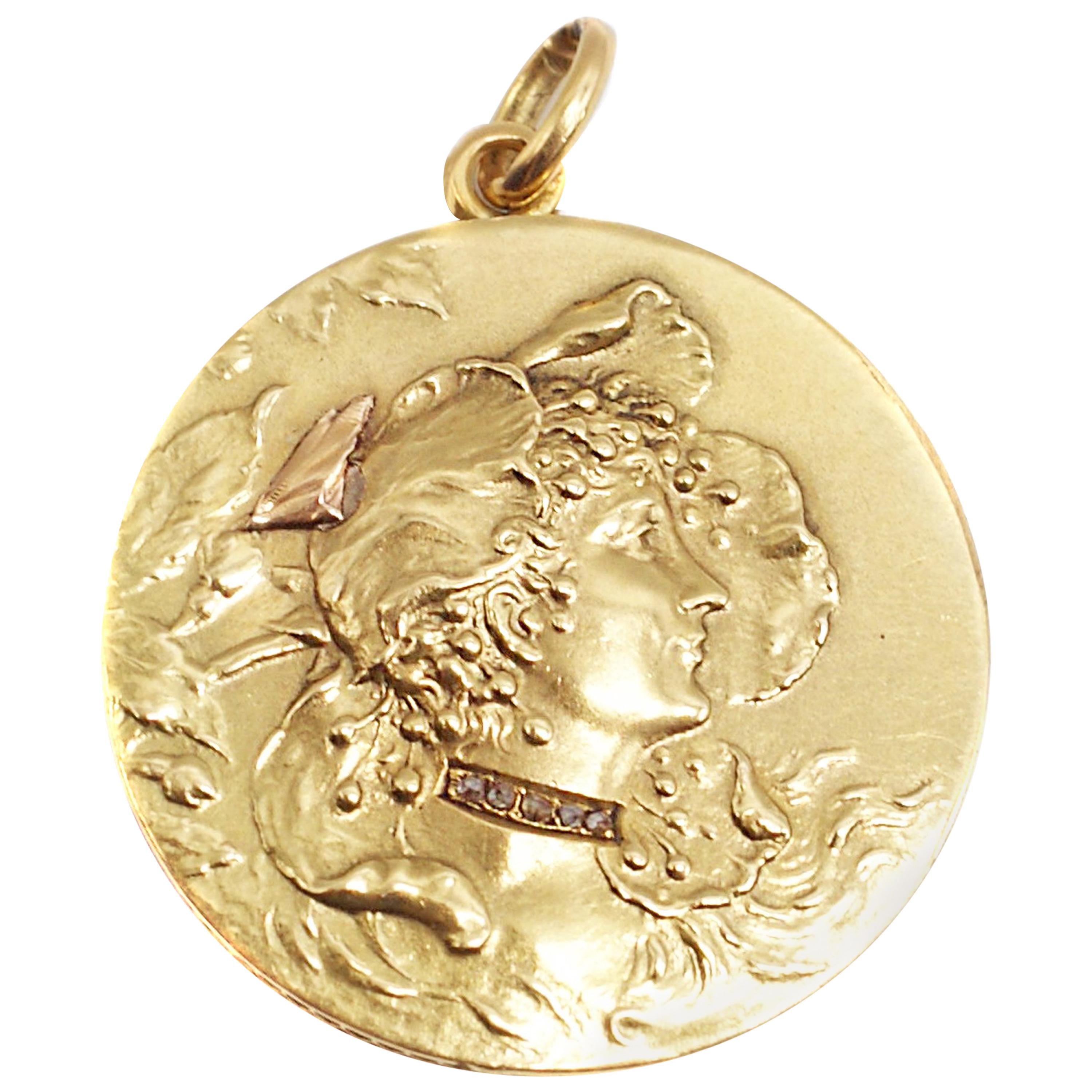Beautiful repose craftsmanship depict every detail of a woman with her hairdo earrings within a floral background typical for this era. A collier-de-chien set with 5 small rose cut diamonds is fitted around the neck giving this medallion pendant a