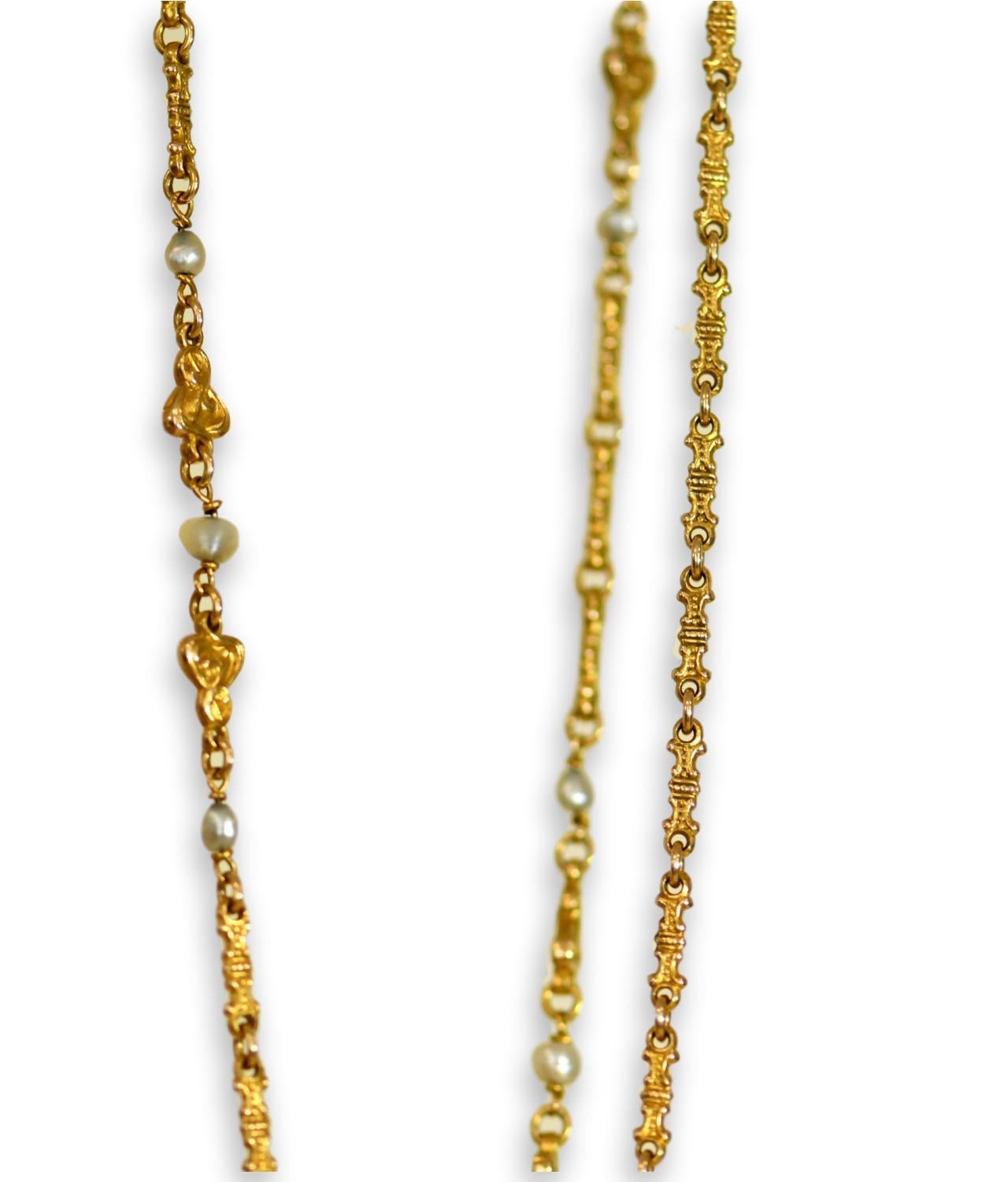 This beautiful long French chain is exceptional, both in design and quality. These chains were in high fashion and many were produced in France around the turn of the 19th and 20th century but you only see the special ones once in a while. 
You can