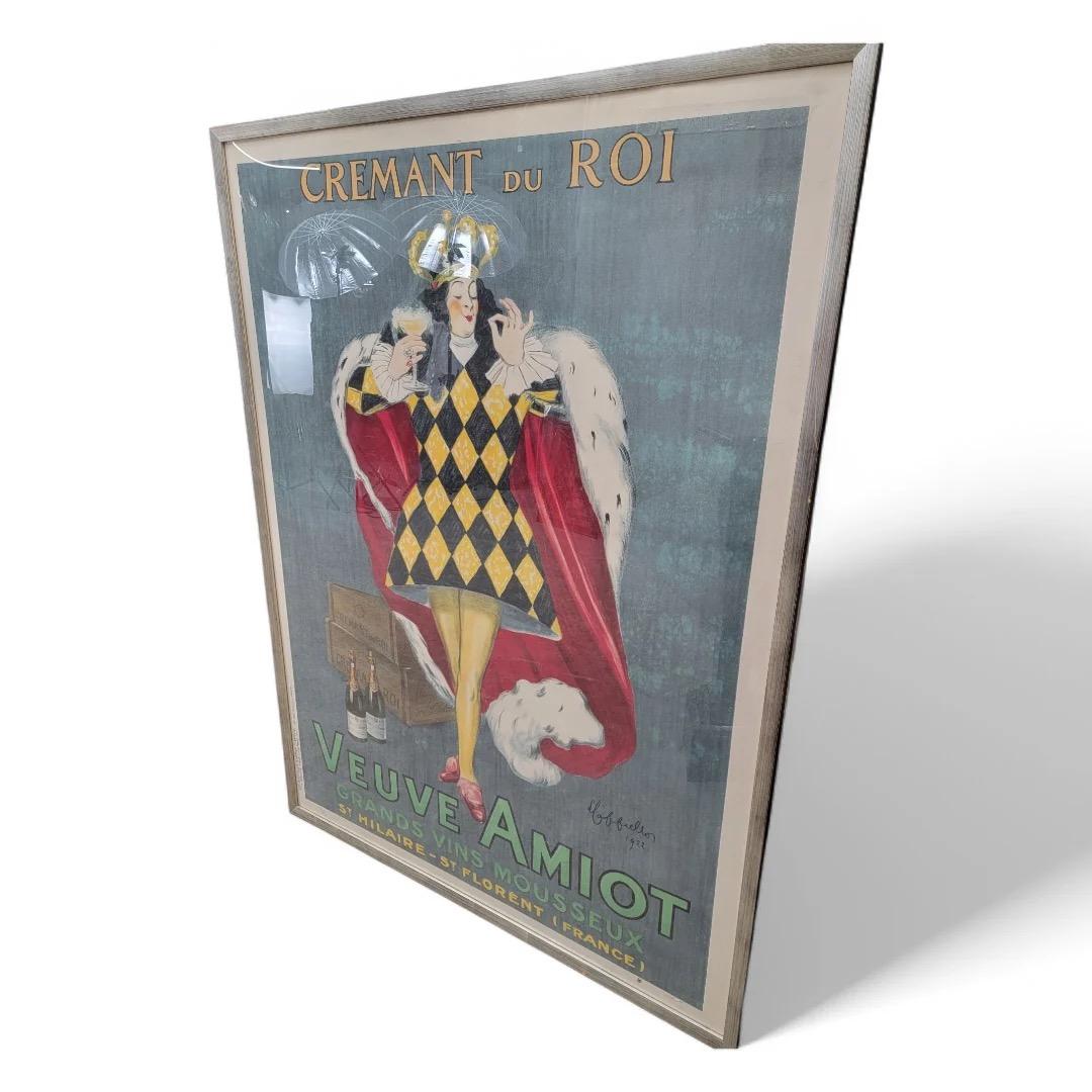 Vintage Art of Vintage français Leonetto Cappiello Publicité Lithographie Affiche pour Veuve Amiot Cremant Du Roi Encadré 

L'image est une affiche publicitaire pour Veuve Amiot Crémant du Roi, un vin pétillant. Elisa Amiot a fondé la distillerie