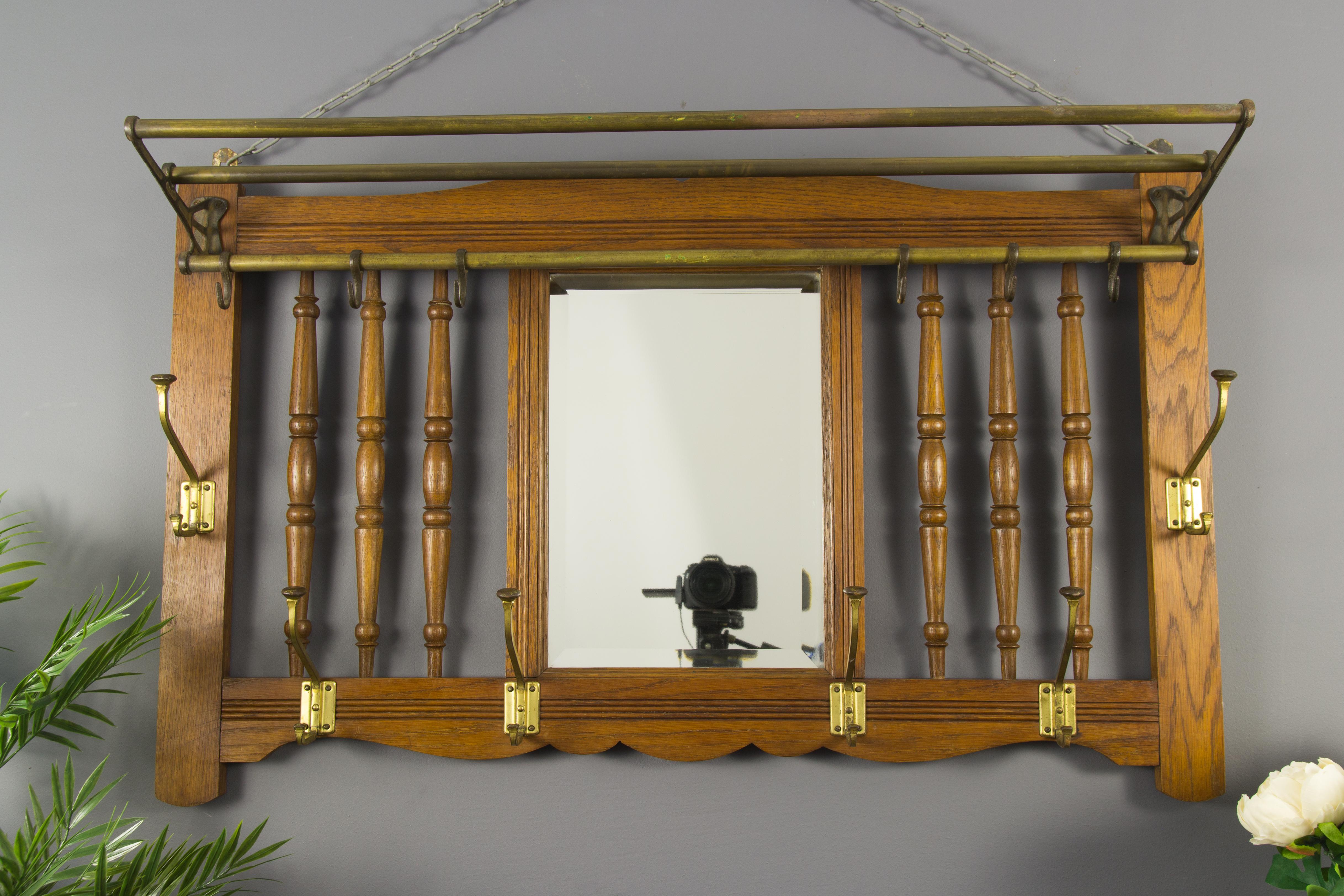 Very nice and practical Art Nouveau style solid oak coat and hat wall rack with six movable small and six large brass hooks. France, circa 1920s.
In very good original antique condition.
Measures:
Height 60 cm / 23.62 in, width 99 cm / 38.97 in,