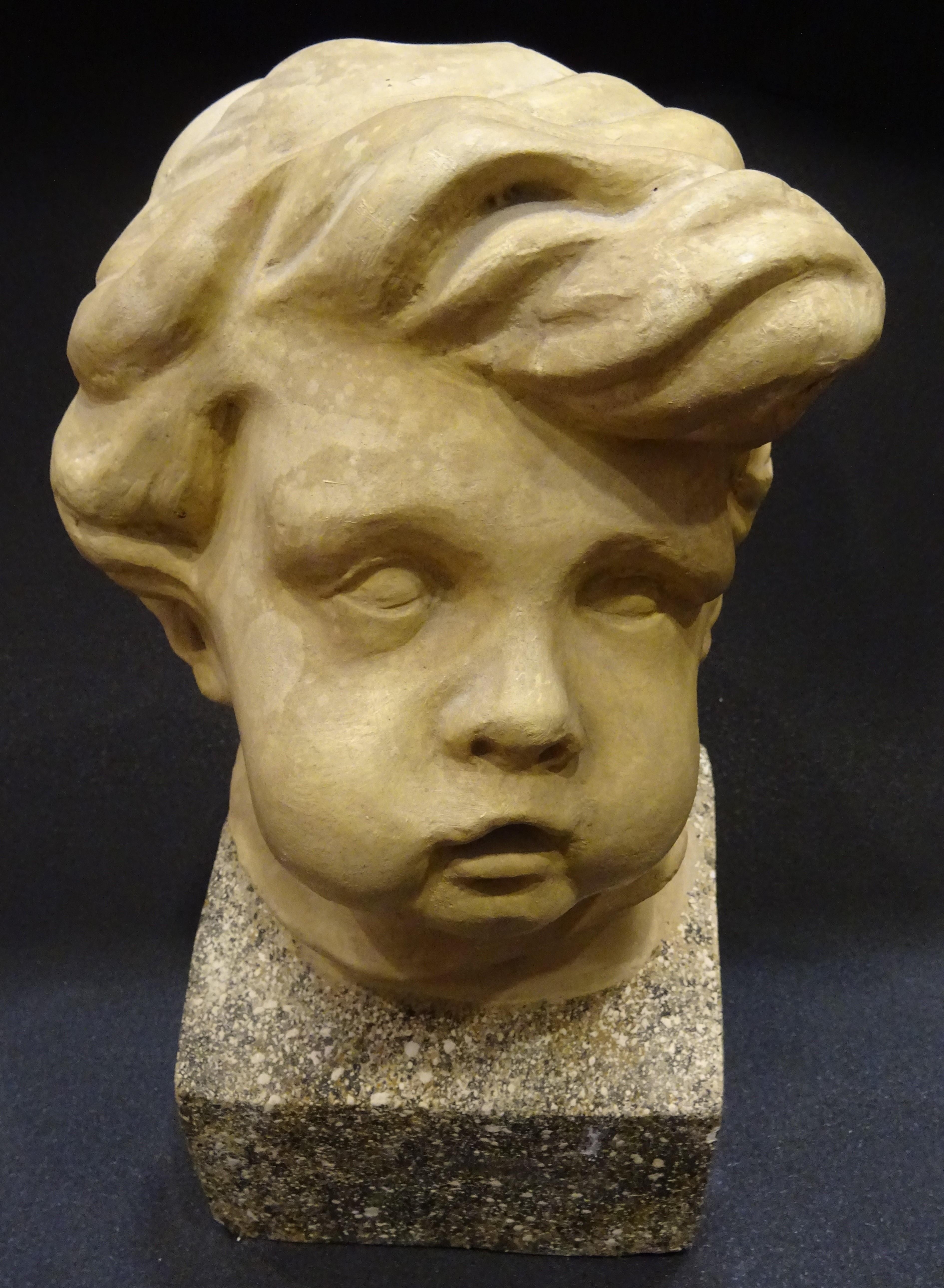 Art Nouveau French School Plaster Carved Child Bust with Base Imitating Stone In Good Condition In Valladolid, ES