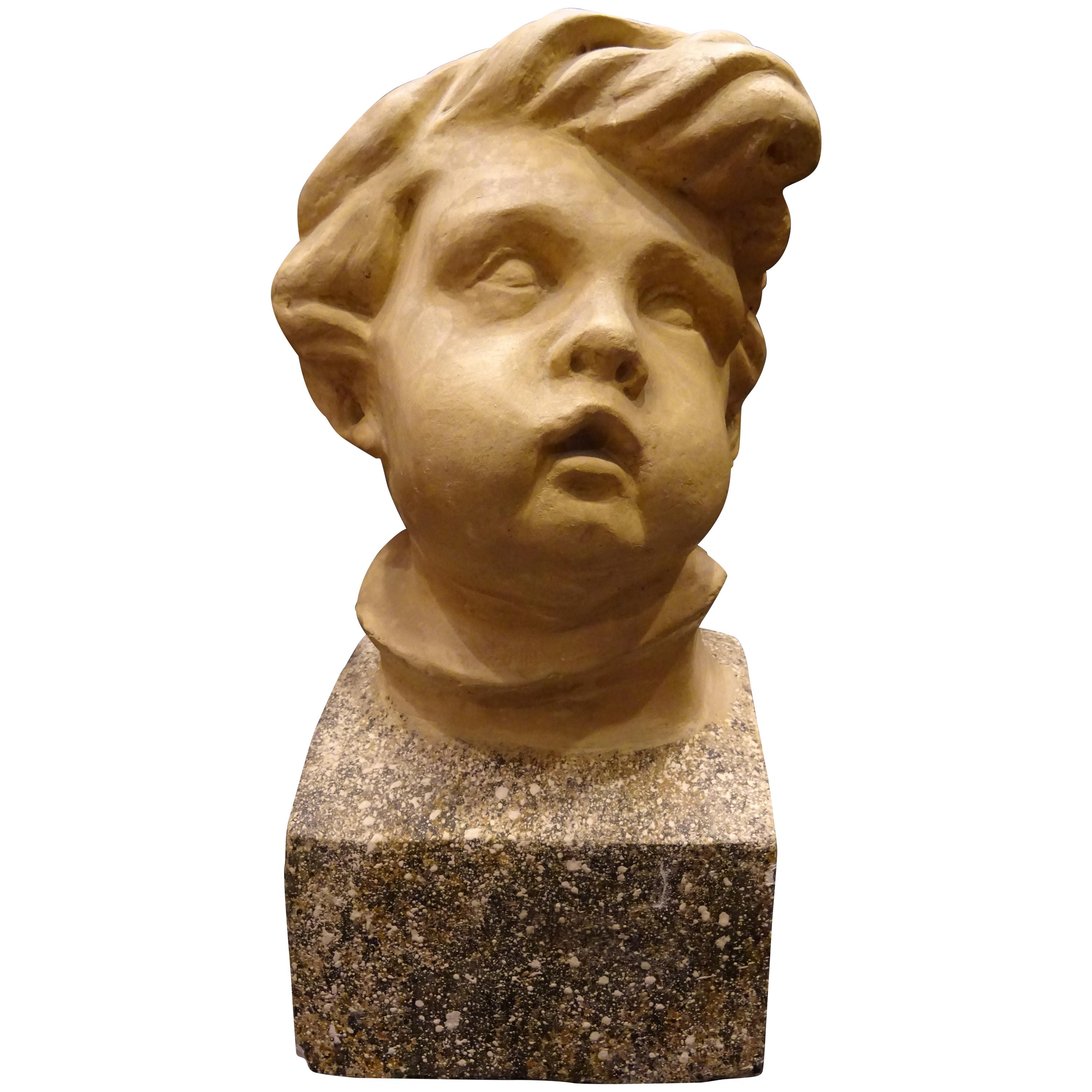 Art Nouveau French School Plaster Carved Child Bust with Base Imitating Stone