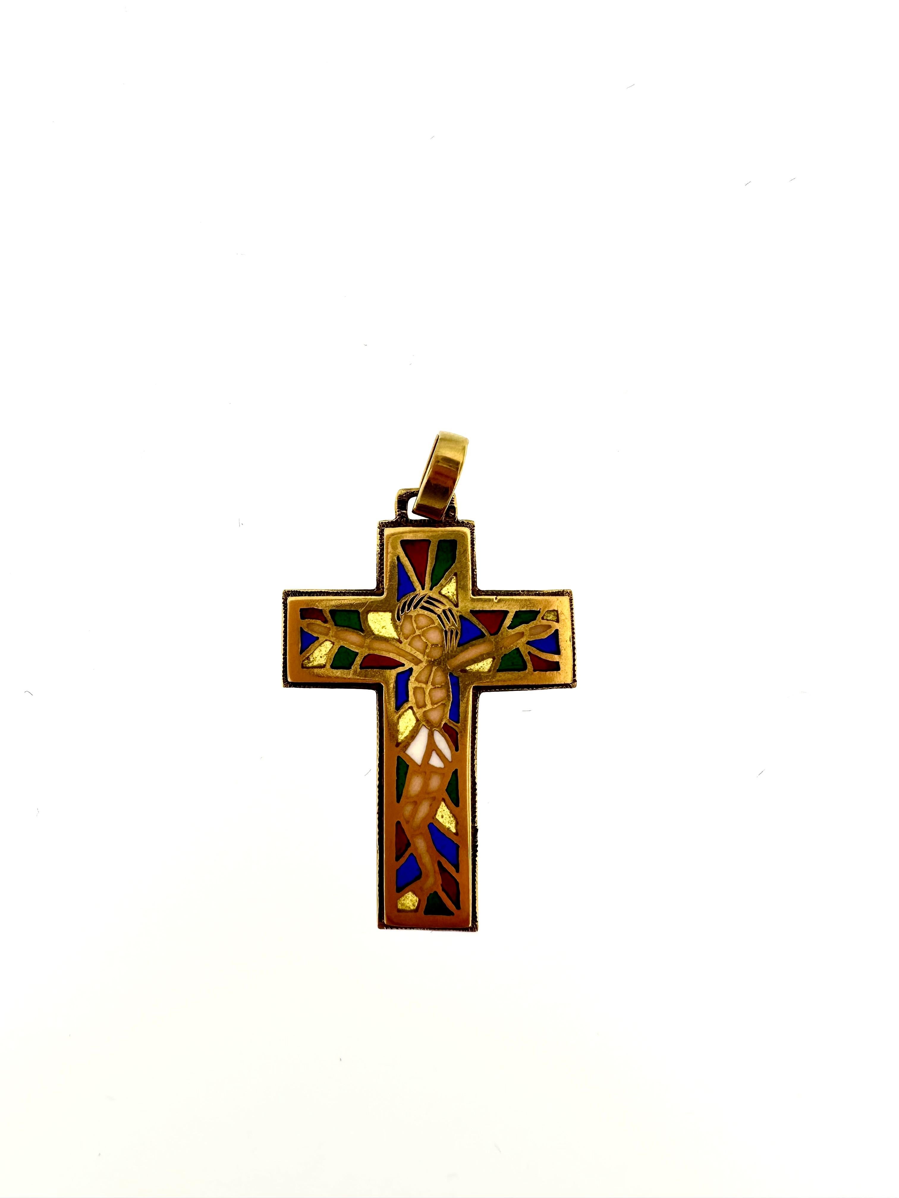 This gorgeous art nouveau cross is made with the stained glass technique, we find blue, red green, yellow, light pink and white among the colors used. This pendant placed against the light gives the effect of the stained glass windows of the