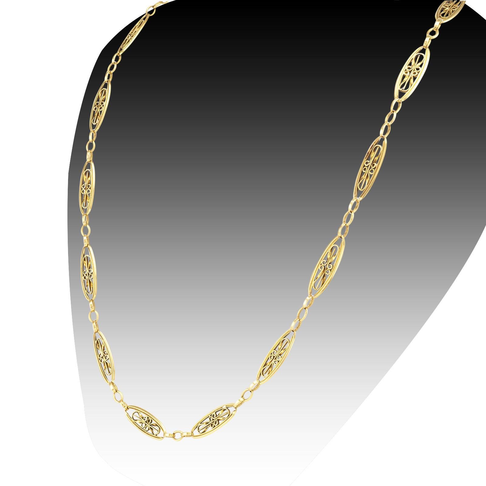 Art Nouveau French yellow gold chain necklace circa 1905. 

DETAILS:

METAL: 18-karat yellow gold.

MEASUREMENTS: approximately 21” (53.3 cm) long and 5/16” (7 mm) wide overall, 21.4 grams.

HALLMARKS: French.

CONDITION: high magnification