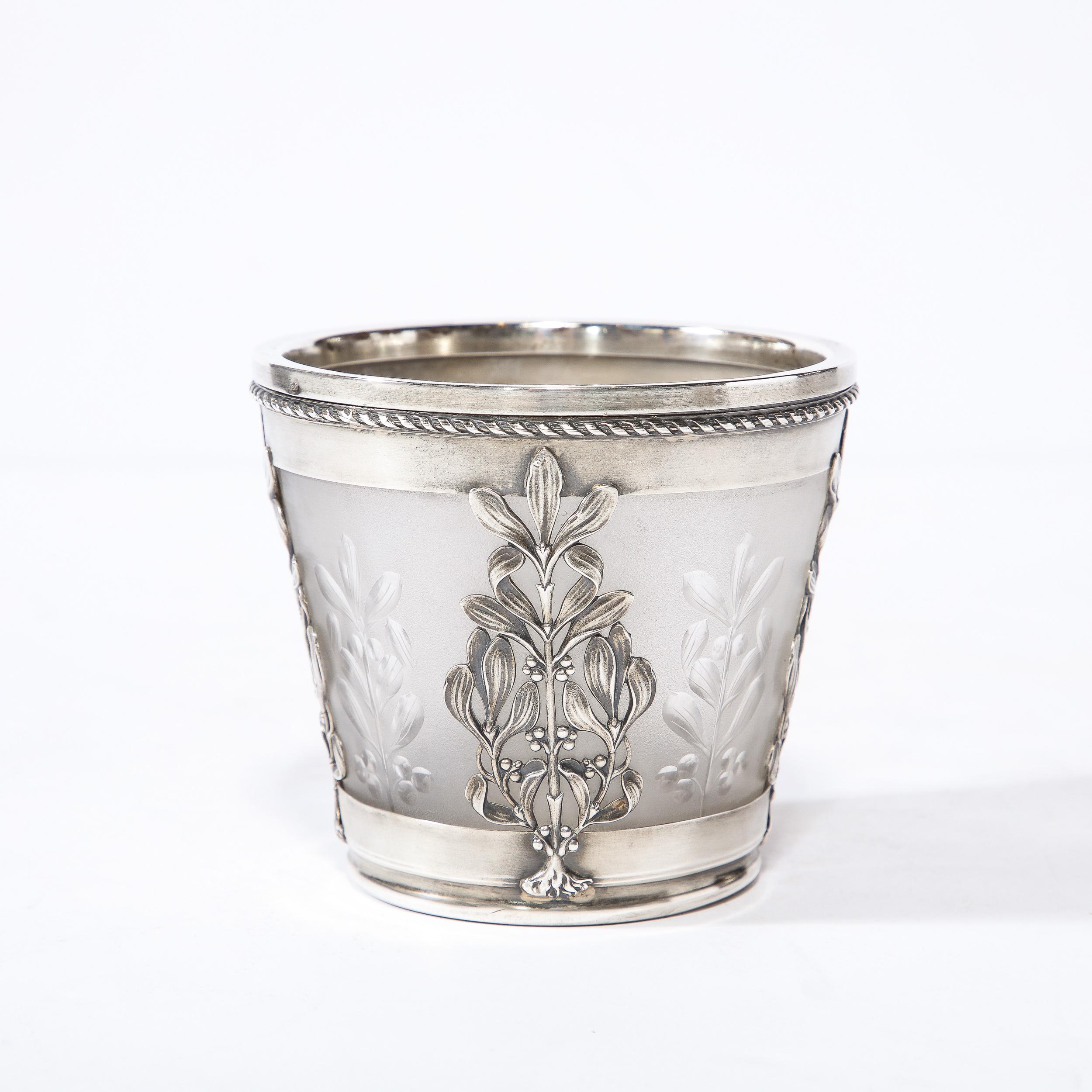 This elegant Art Nouveau Cachepot was realized by the esteemed silversmith Emile Langlois in France circa 1900. It offers a subtly conical form with stylized foliate forms, suggestive of olive trees, etched into the frosted glass body. Olive tree