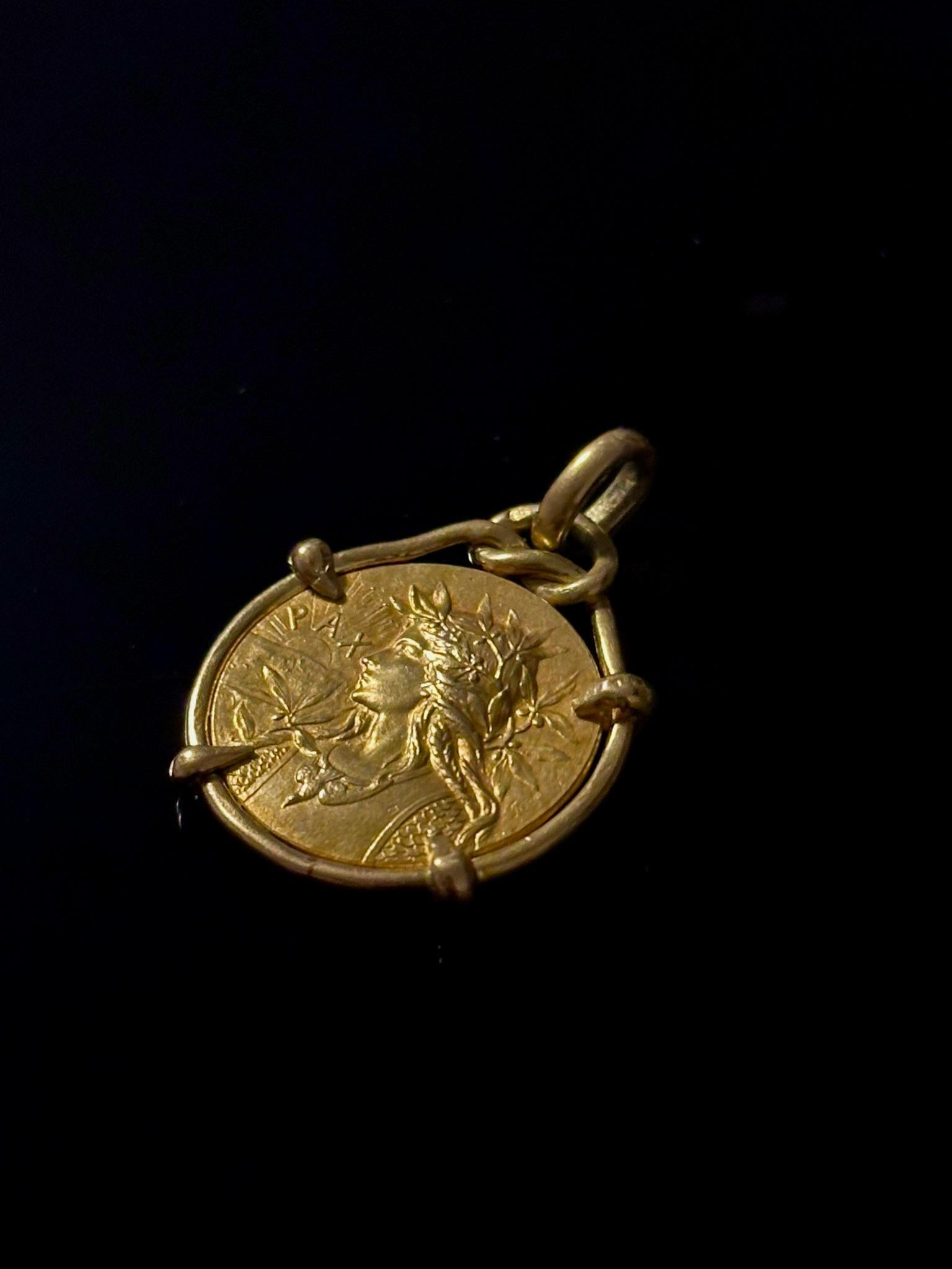 Art Nouveau Edwardian Double Sided Medal Pendant depicting Gallic Rooster  on one side and Gallia Victrix with the inscription in latin « PAX» on the other side. The medal dates early 1900s and is the art work of the prominent French jeweler
