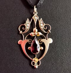 Art Nouveau Garnet and Pearl Lavalier Pendant, 9 Karat Yellow Gold