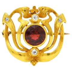 Art Nouveau Garnet Diamond 14 Karat Yellow Gold Clover Whiplash Antique Brooch