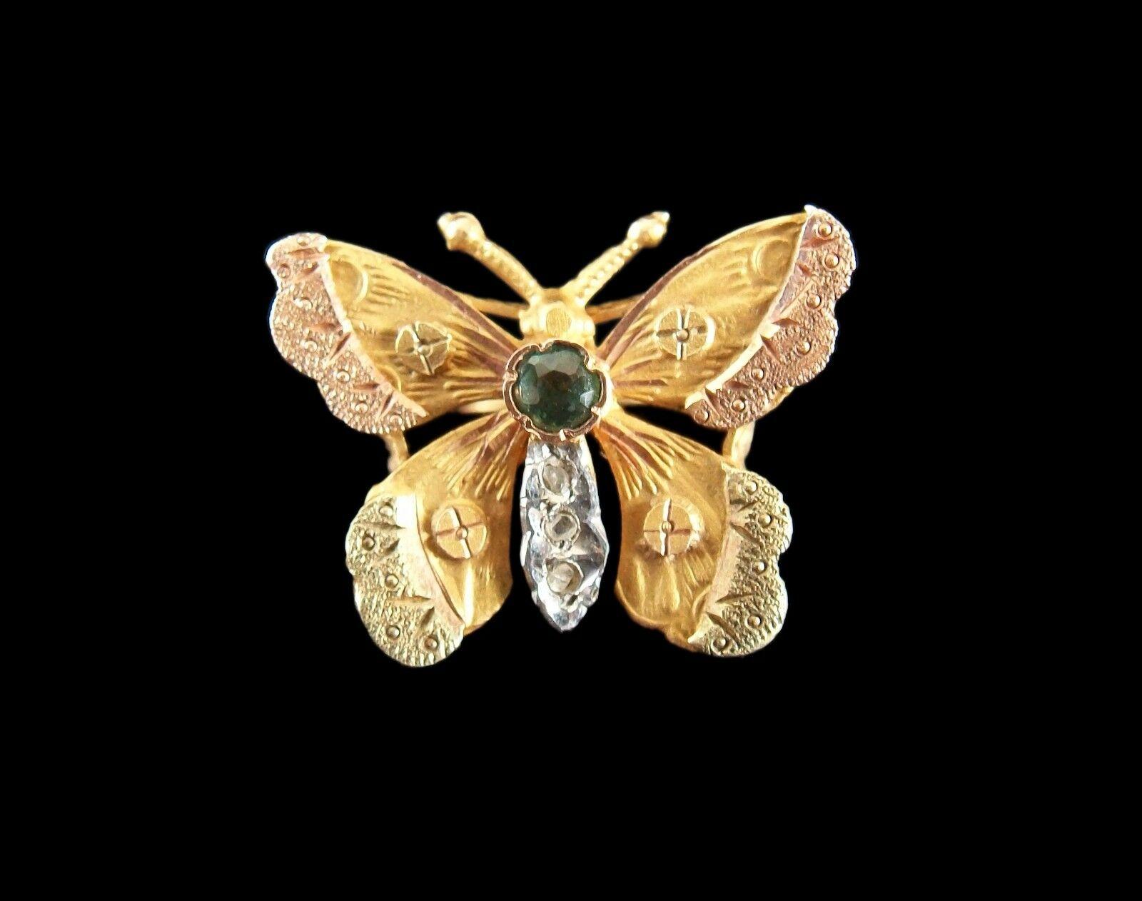 Art Nouveau Butterfly necklace slide/pendant - 18K yellow gold wings with pink and green gold wing tips and white gold body - one bezel set emerald and three small diamonds form the body - fine tooling to the wings - butterfly clips to the back -