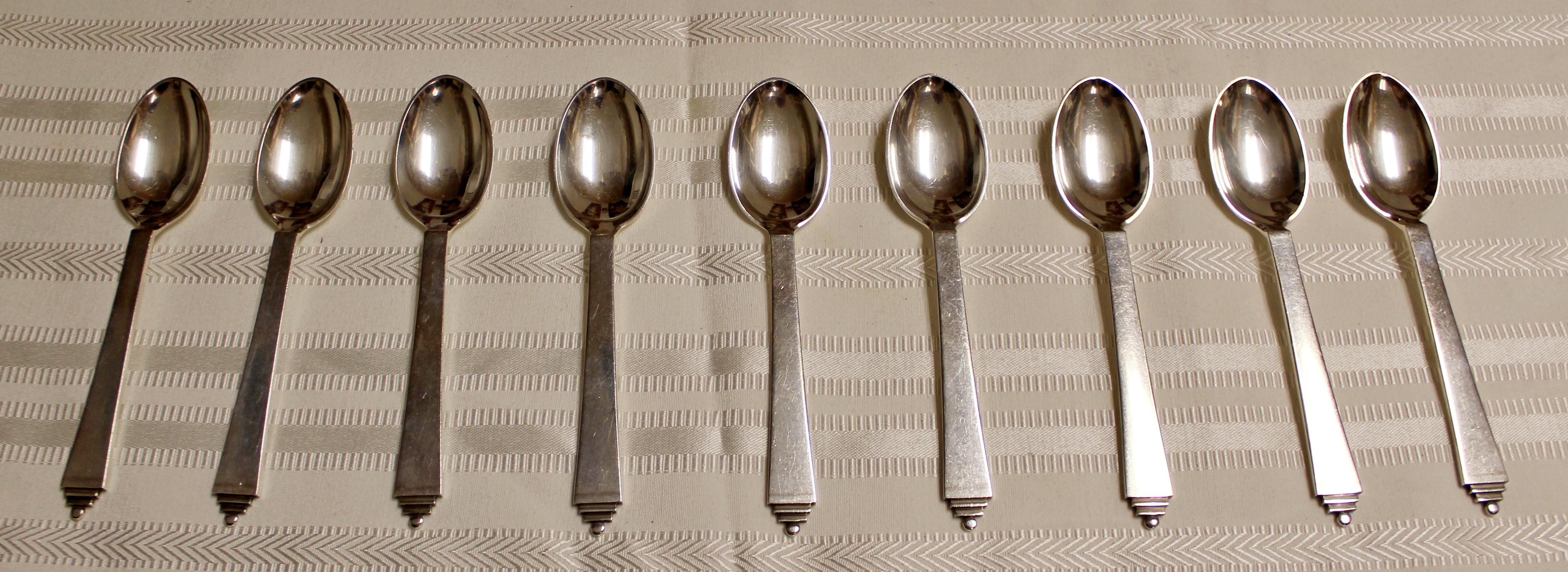 For your consideration is a Classic set of 9 Georg Jensen, sterling silver pyramid pattern coffee spoons, circa 1945. In excellent vintage condition. The dimensions are 5.5